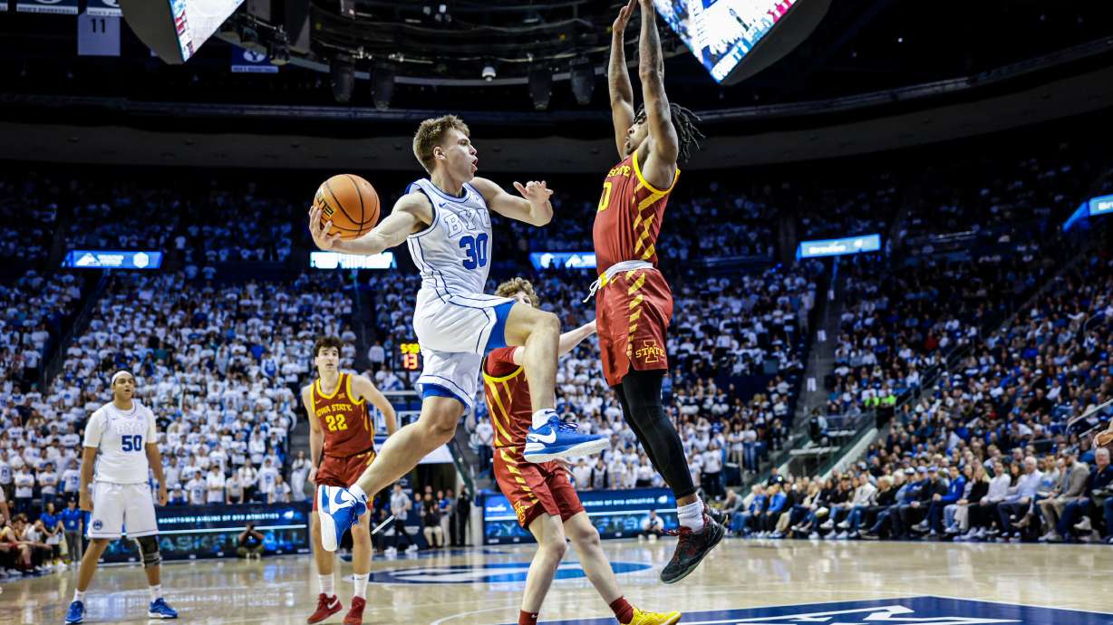 BYU guard Dallin Hall drives against Iowa Stat during a Big 12 men's basketball game, Tuesday, Jan. 16, 2024 at the Marriott Center in Provo, Utah.