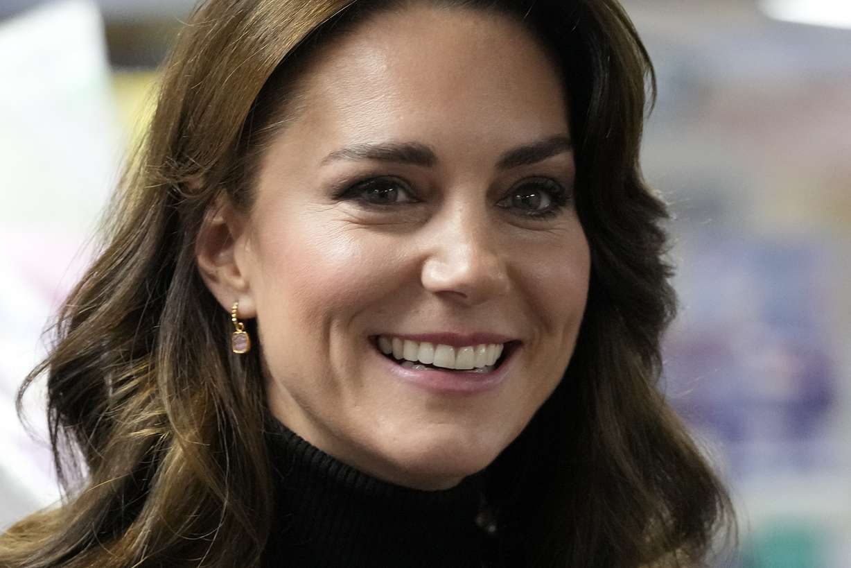 Kate, Princess of Wales, smiles as she speaks to a woman during her visit to Sebby's Corner in north London, Nov. 24, 2023. The Princess of Wales has been hospitalized for planned abdominal surgery and will remain at The London Clinic for up to two weeks, Kensington Palace said Wednesday.