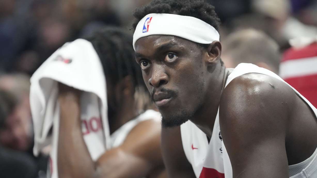 Toronto Raptors forward Pascal Siakam sits on the bench during the first half of an NBA basketball game against the Utah Jazz, Friday, Jan. 12, 2024, in Salt Lake City.