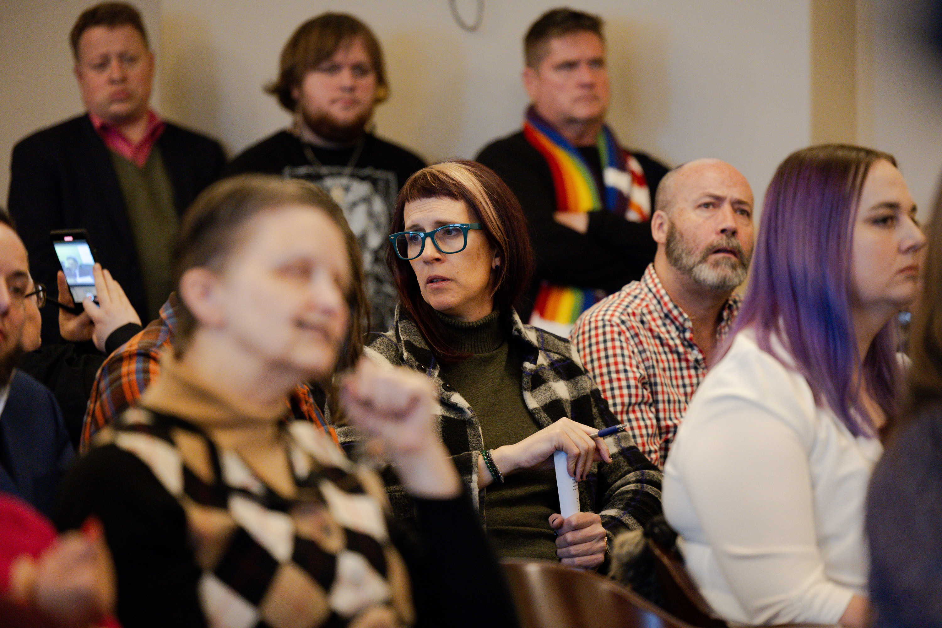 Audience members react during a hearing committee on HB257, Sex-based Designations for Privacy, Anti-bullying, and Women’s Opportunities, at the Utah Capitol in Salt Lake City on Wednesday.