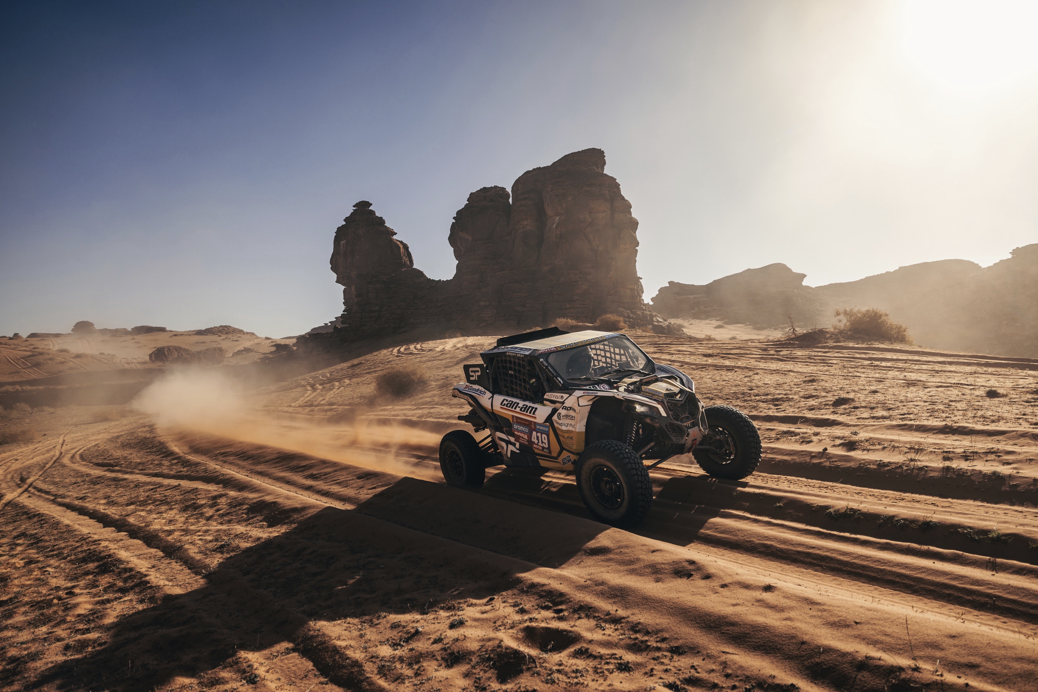 In a photo provided by Can-Am Off-Road, Sara Price drives during Stage 10 of the Dakar Rally on Wednesday, Jan. 17, 2024, near Al-Ula, Saudi Arabia. 