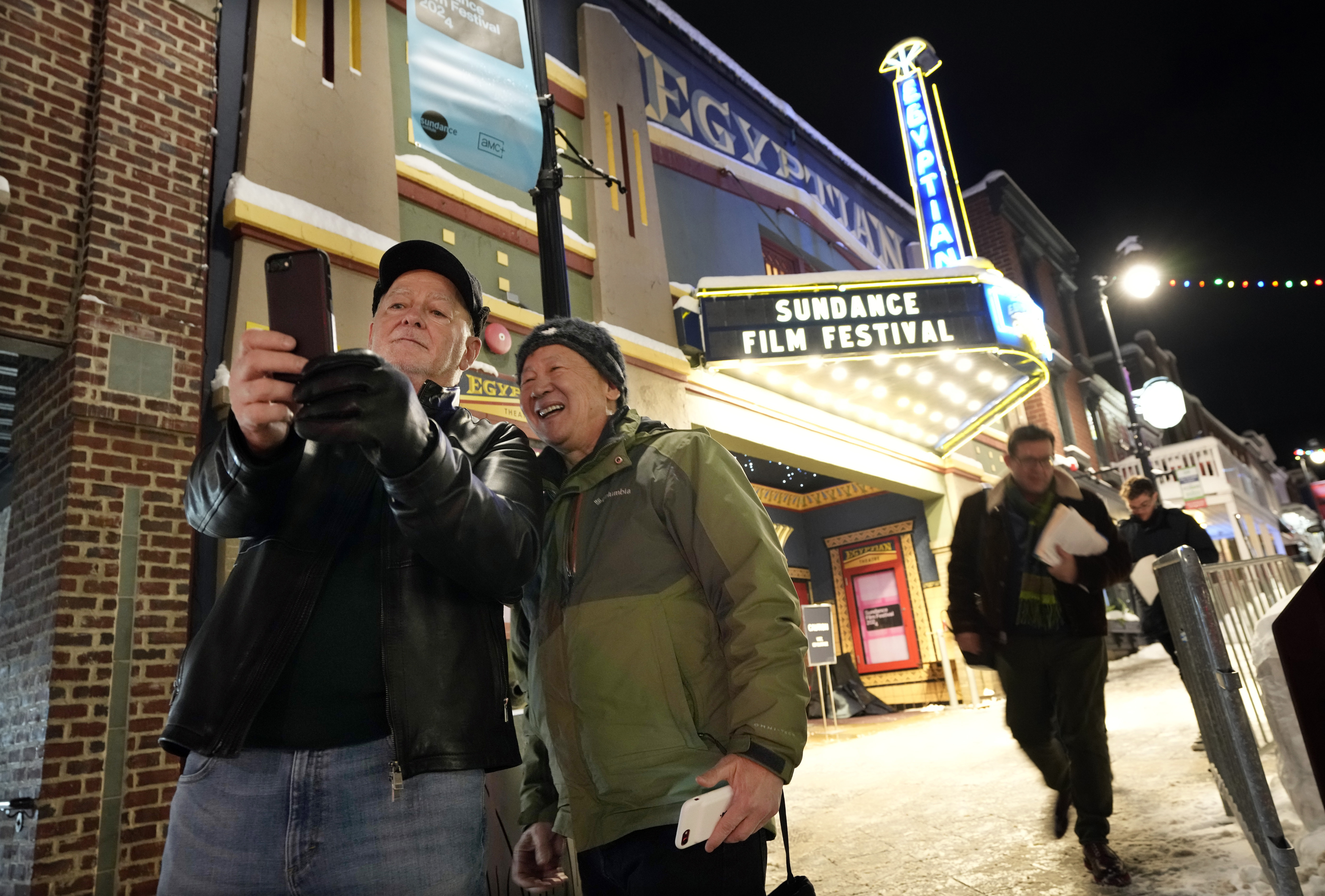 Kenneth Baran, left, and Clement Chen pose for a selfie outside the Egyptian Theatre before the start of the Sundance Film Festival, Wednesday, in Park City. This year's festival runs from Jan. 18-28 at venues around Park City and Salt Lake City.