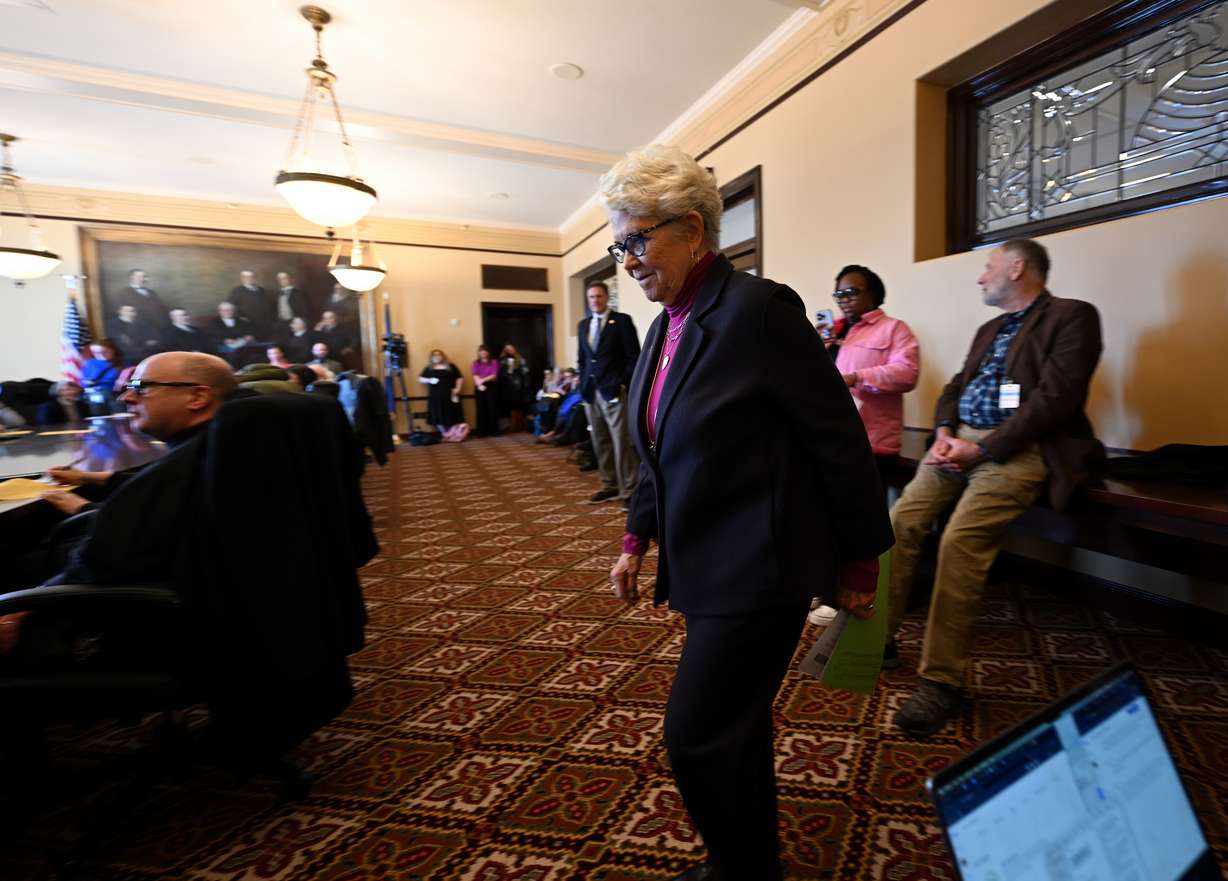 Rep. Carol Spackman Moss, D-Holladay, walks to the podium at the Capitol in Salt Lake City for Faith, Hunger and Homelessness Day to express support for a legislative proposal that would reduce homelessness on Thursday.