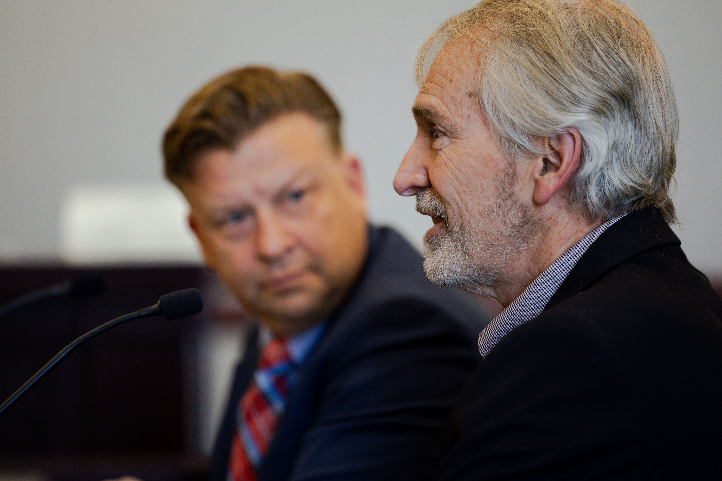 Front, Aaron Davidson, Utah County clerk, speaks during the public comment section of a proposed substitute bill, County Clerk Amendments, sponsored by Sen. Todd Weiler, R-Woods Cross, during a Senate Government Operations and Political Subdivisions Standing Committee hearing at the Utah Capitol in Salt Lake City on Thursday.
