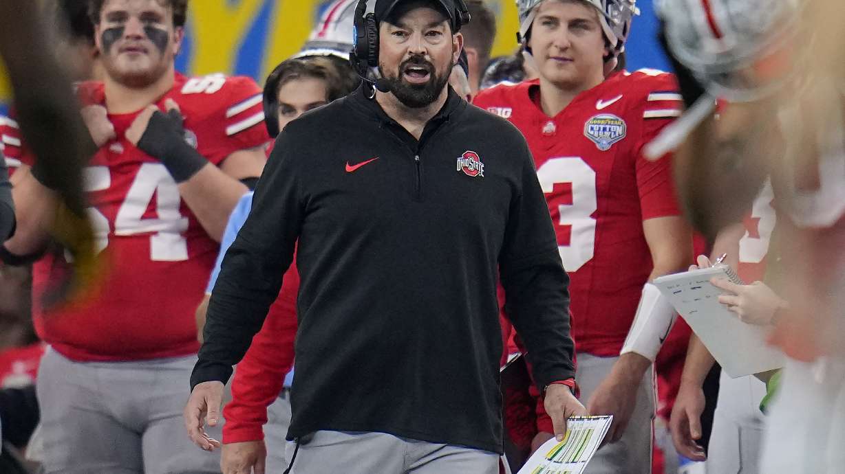 Ohio State head coach Ryan Day, center, reacts on the sideline during the second half of the Cotton Bowl NCAA college football game against Missouri, Friday, Dec. 29, 2023, in Arlington, Texas.