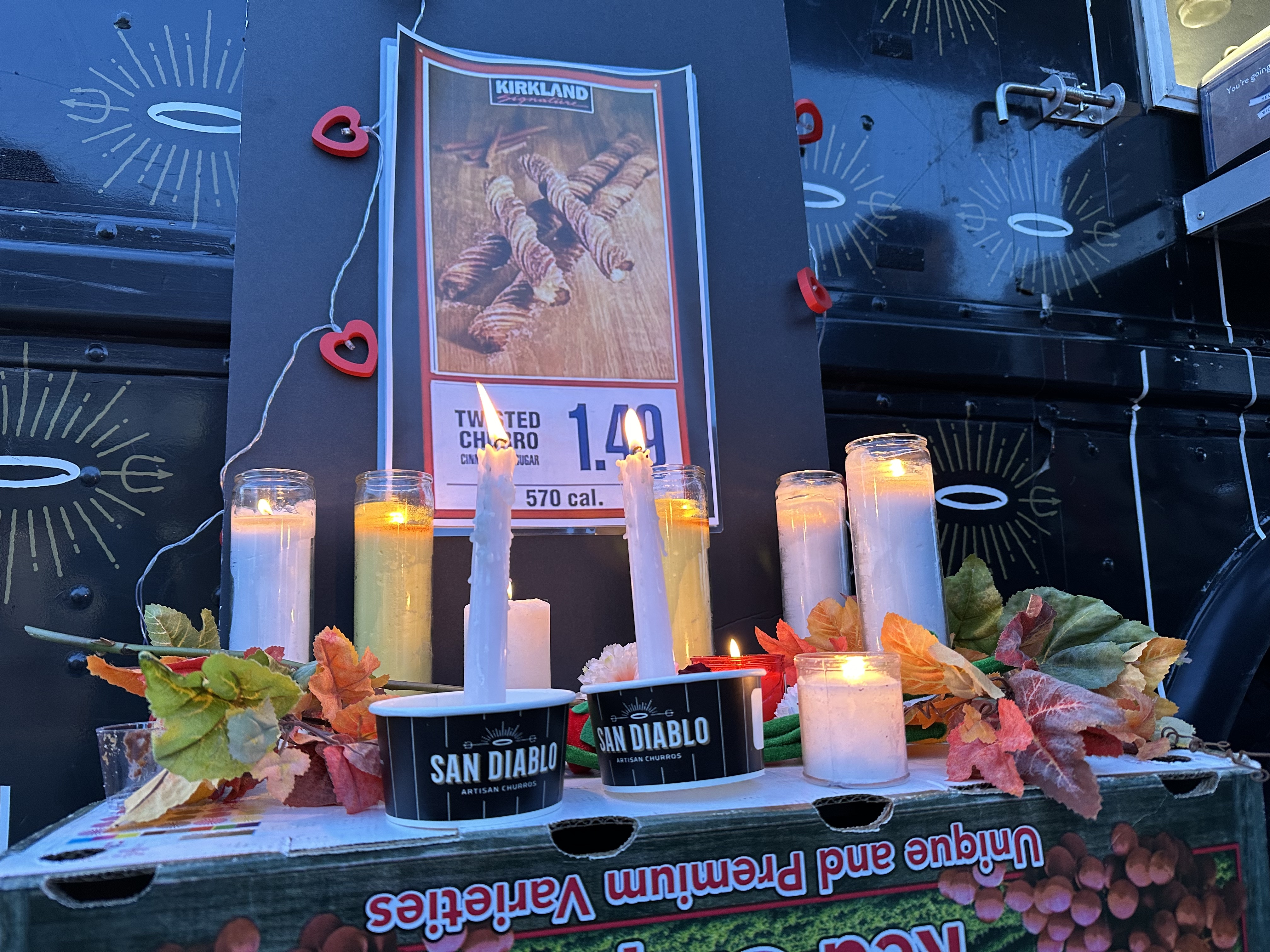 San Diablo Artisan Churros hosted a memorial in honor of the "death" of the Costco churro, which has been discontinued in stores. Attendees paid respects at an altar decorated with candles.