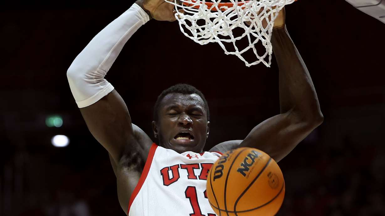 Utah Utes center Keba Keita (13) scores against Oregon State at the University of Utah’s Huntsman Center in Salt Lake City on Thursday, Jan. 18, 2024.