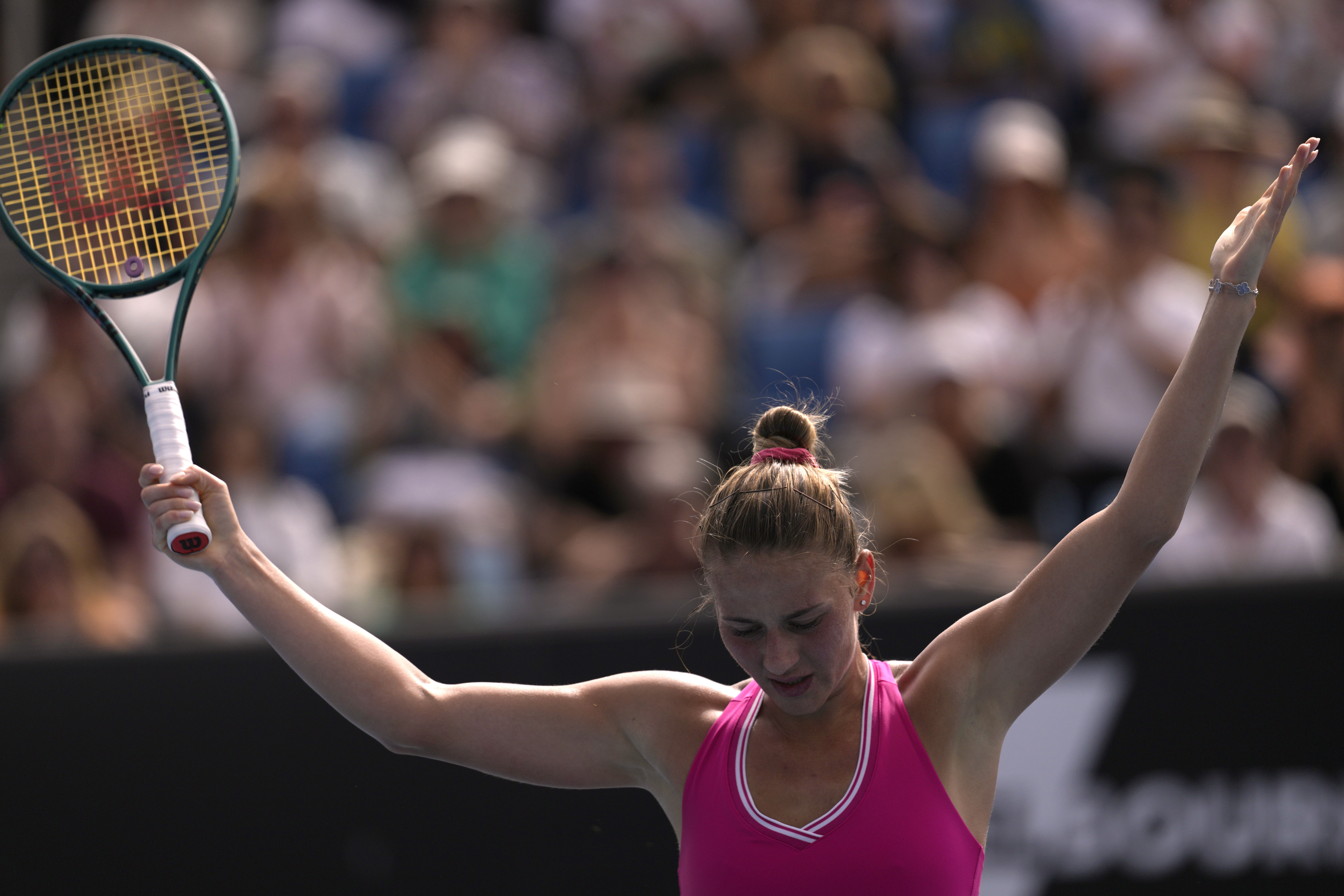 Marta Kostyuk of Ukraine reacts during her third round match against Elina Avanesyan of Russia at the Australian Open tennis championships at Melbourne Park, Melbourne, Australia, Friday, Jan. 19, 2024. 