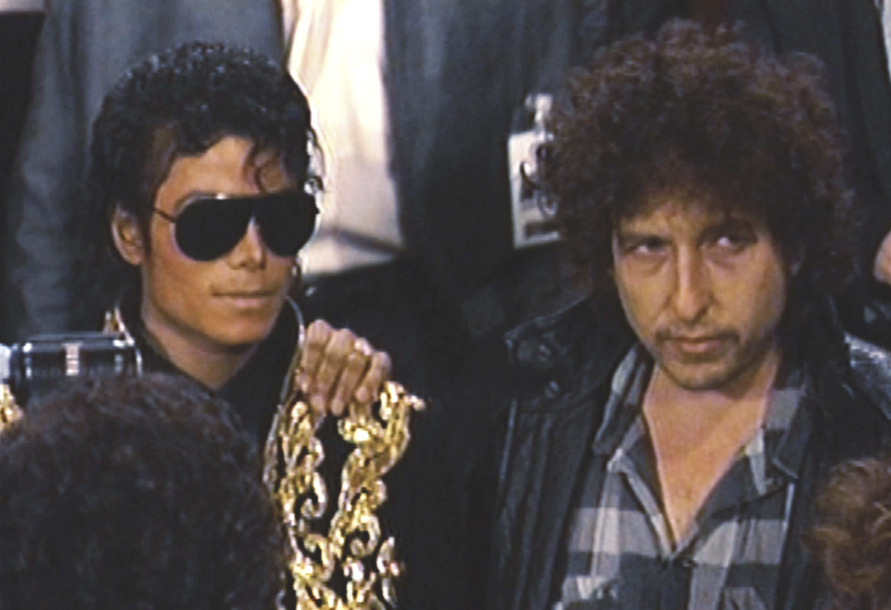 This image released by Netflix shows Michael Jackson, left, and Bob Dylan in a scene from "The Greatest Night in Pop."