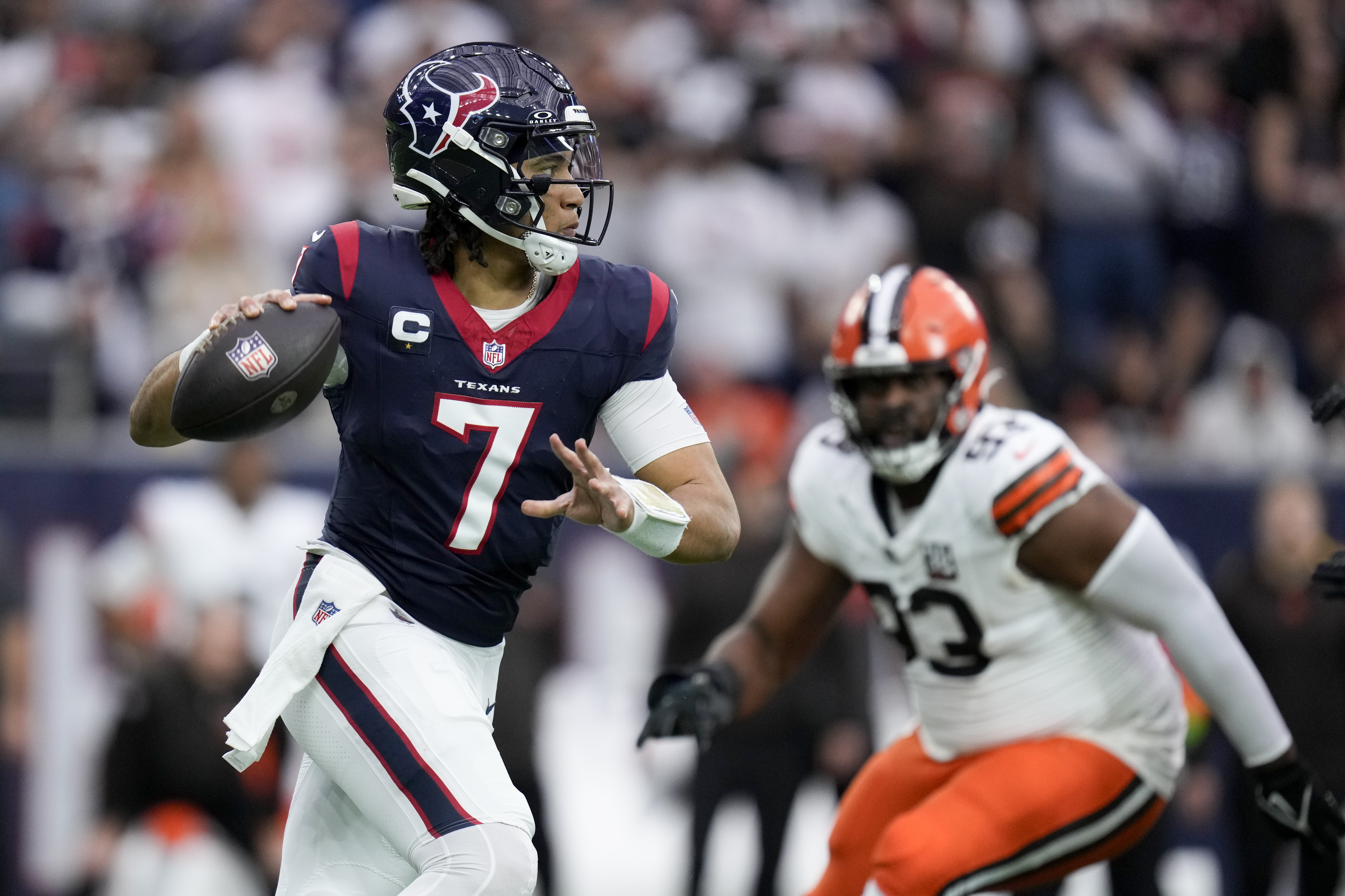 Houston Texans quarterback C.J. Stroud passes against the Cleveland Browns during the first half of an NFL wild-card playoff football game Saturday, Jan. 13, 2024, in Houston. 