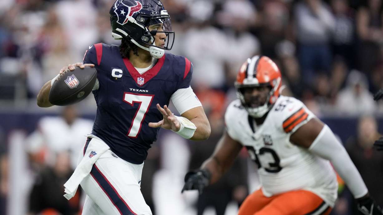 Houston Texans quarterback C.J. Stroud passes against the Cleveland Browns during the first half of an NFL wild-card playoff football game Saturday, Jan. 13, 2024, in Houston.