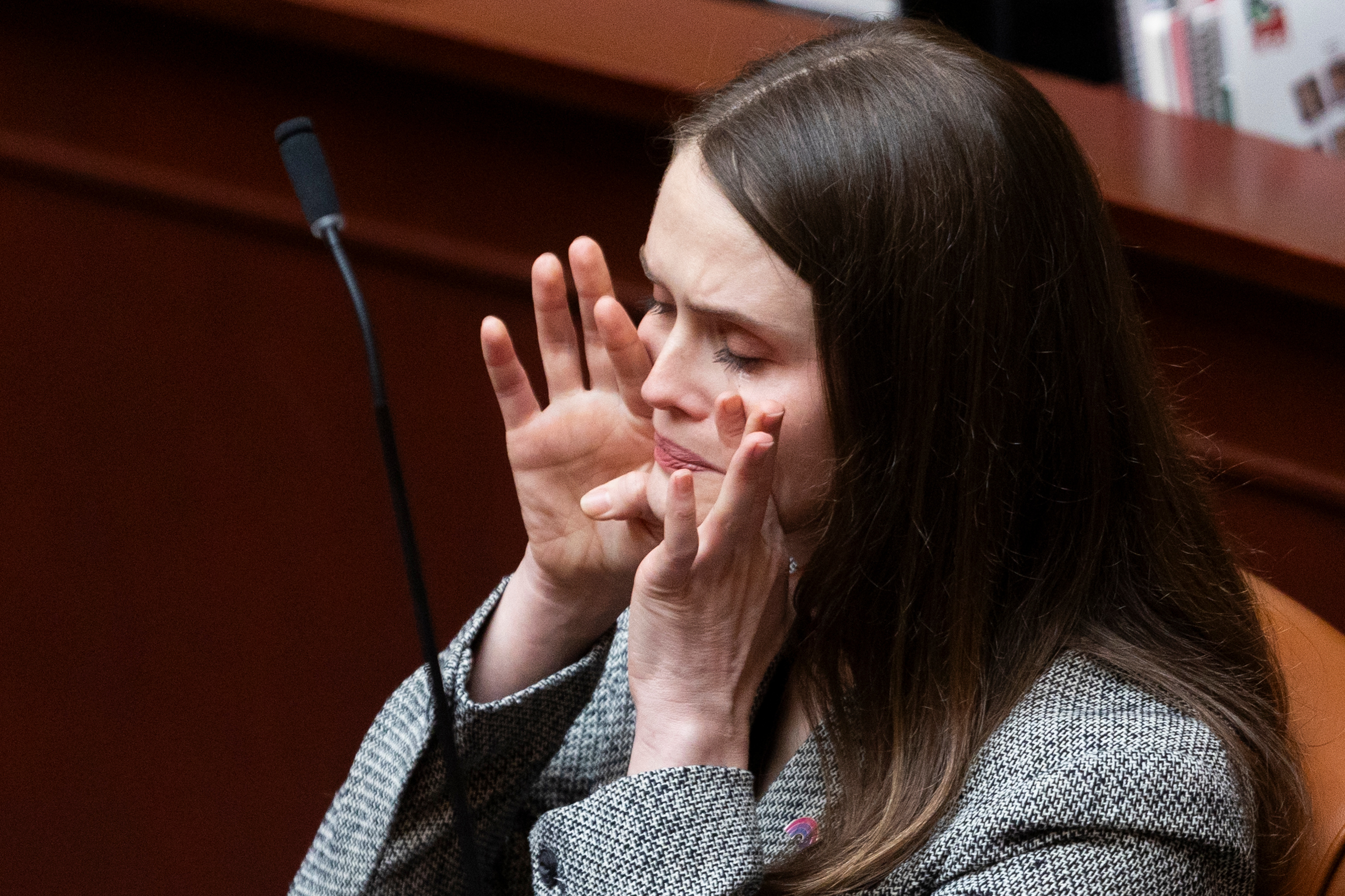 Rep. Sahara Hayes, D-Millcreek, wipes her eyes after speaking about HB257 at the Capitol in Salt Lake City on Friday.