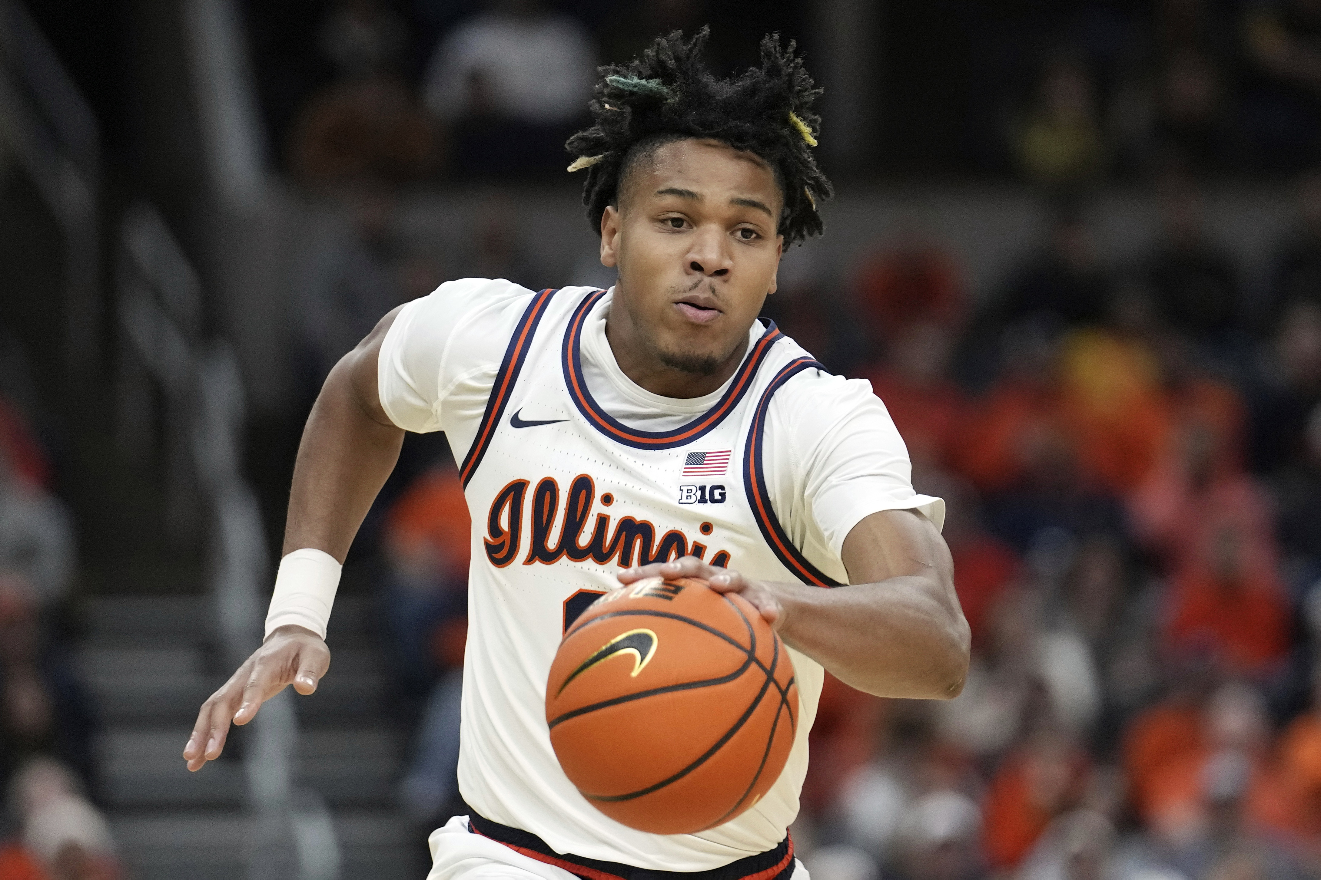 FILE - Illinois' Terrence Shannon Jr. brings the ball down the court during the first half of an NCAA college basketball game against Missouri Friday, Dec. 22, 2023, in St. Louis. Shannon filed a temporary restraining order Monday, Jan 8, 2024, against the university in an effort to be reinstated after being suspended indefinitely following a rape charge stemming from an alleged incident that happened when the football team played at Kansas in September. 