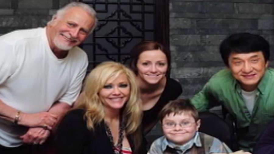 Dayne, seen here in the bottom right, met one of his heroes, Jackie Chan, when he was 13.