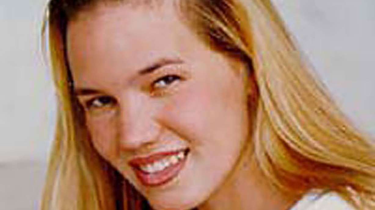 The family of Kristin Smart, a freshman who disappeared from a California campus in 1996, is suing the school for negligence and wrongful death, saying it botched the investigation and allowed her killer to attend the school despite previous accusations against him.