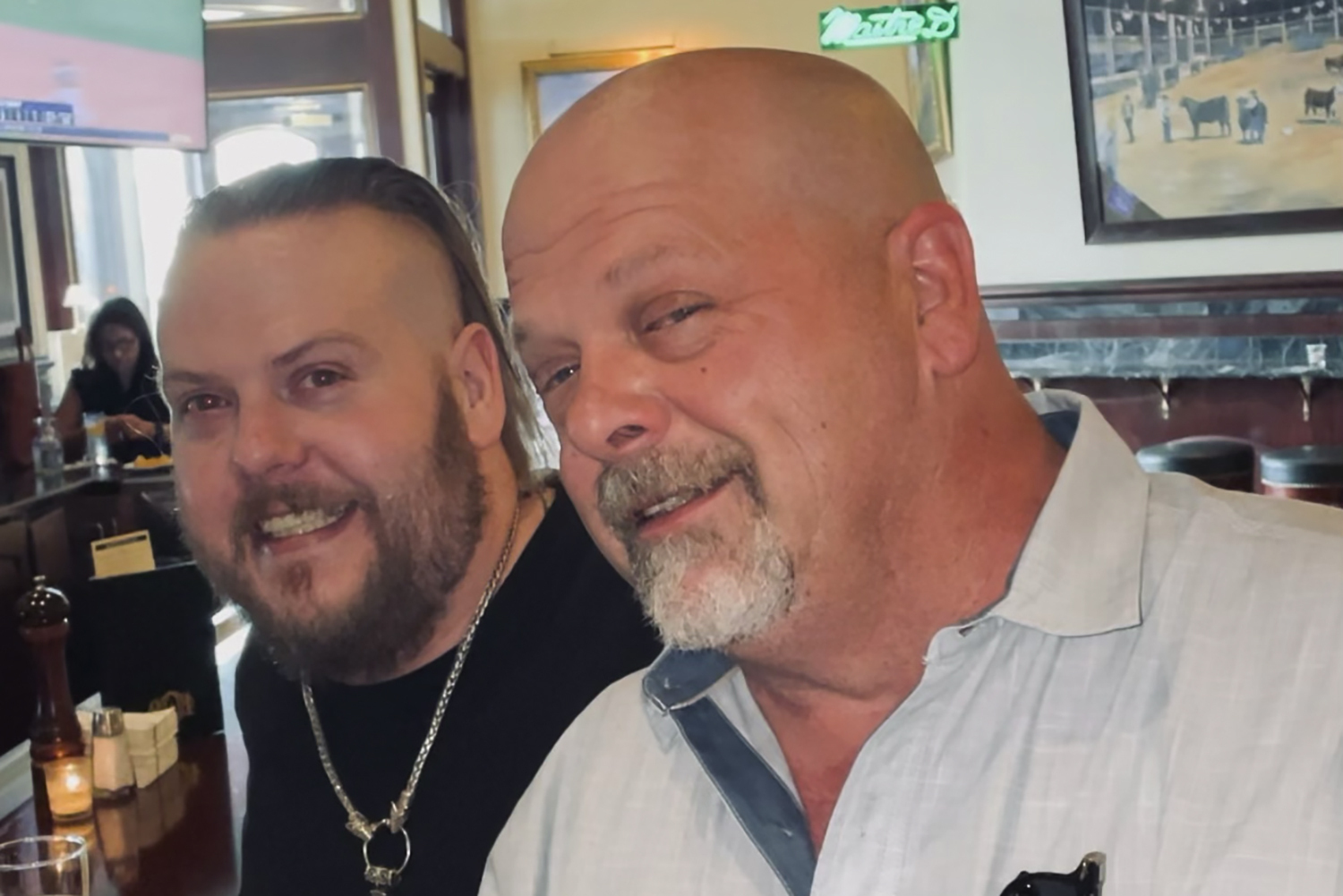 This undated photo provided by Laura Herlovich shows from left, Adam and Rick Harrison. Adam, one of three sons of reality TV show “Pawn Stars” celebrity Richard “Rick” Harrison, has died in Las Vegas, a family representative said Saturday, he was 39.