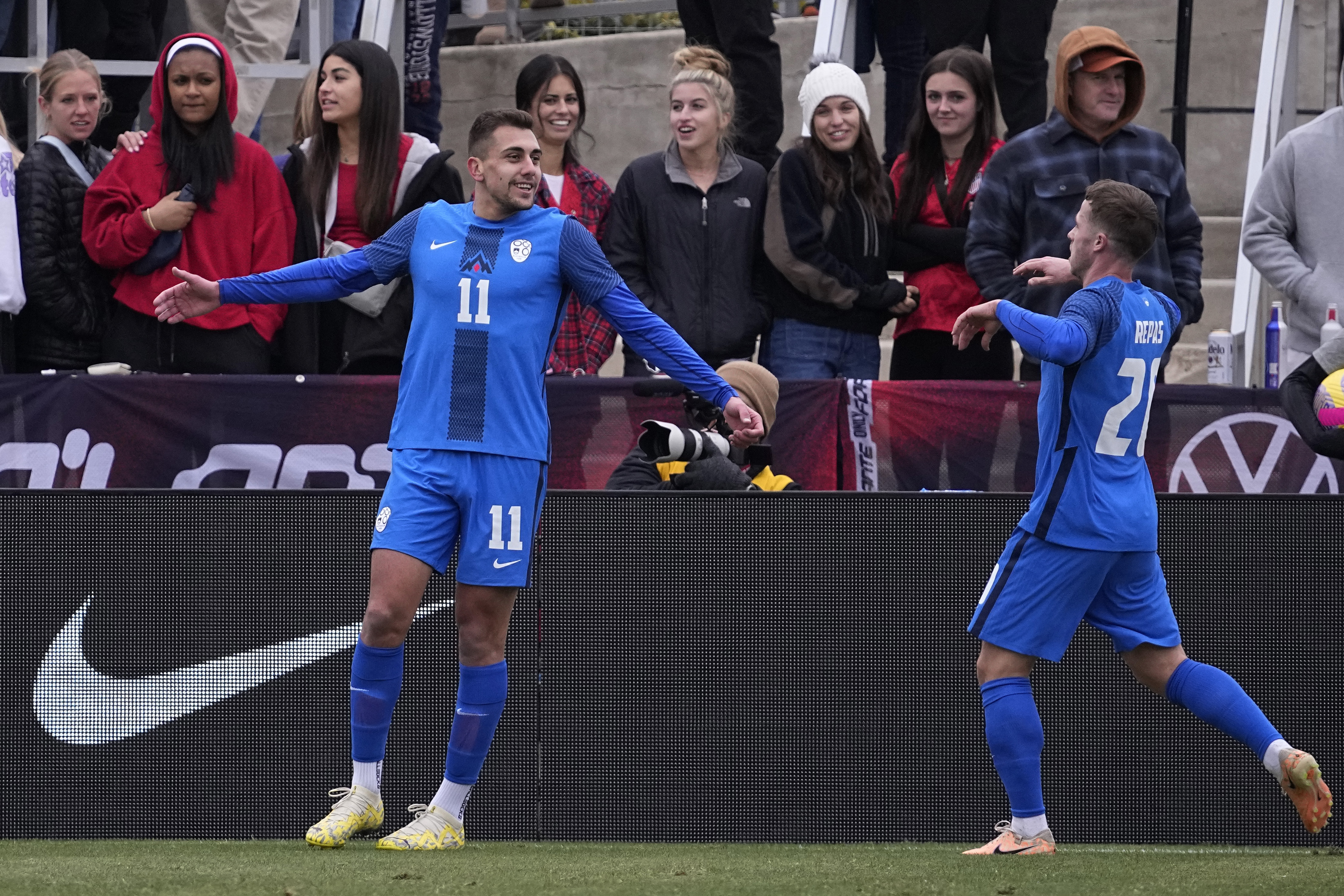 Slovenia forward Nejc Gradisar (11) celebrates his goal with teammate Matija Kavcic (21) during the first half of an international friendly soccer match against the United States in San Antonio, Saturday, Jan. 20, 2024. 