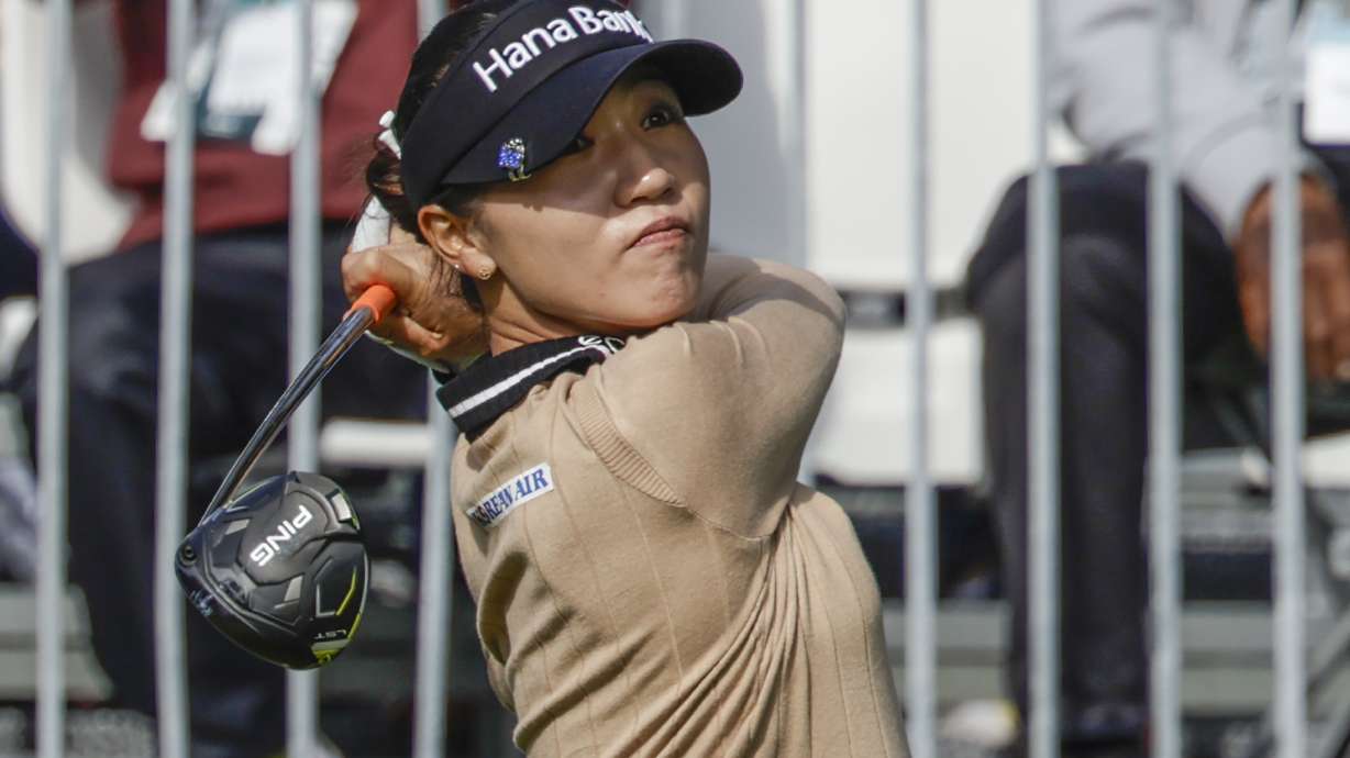 Lydia Ko, from New Zealand, watches tee shot on the first hole during the first round of the Hilton Grand Vacations Tournament of Champions LPGA golf tournament Thursday, Jan. 18, 2024, in Orlando, Fla.