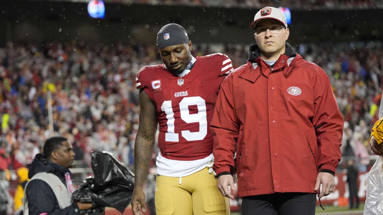 San Francisco 49ers wide receiver Deebo Samuel (19) walks off the field after an injury during the first half of an NFL football NFC divisional playoff game against the Green Bay Packers, Saturday, Jan. 20, 2024, in Santa Clara, Calif.