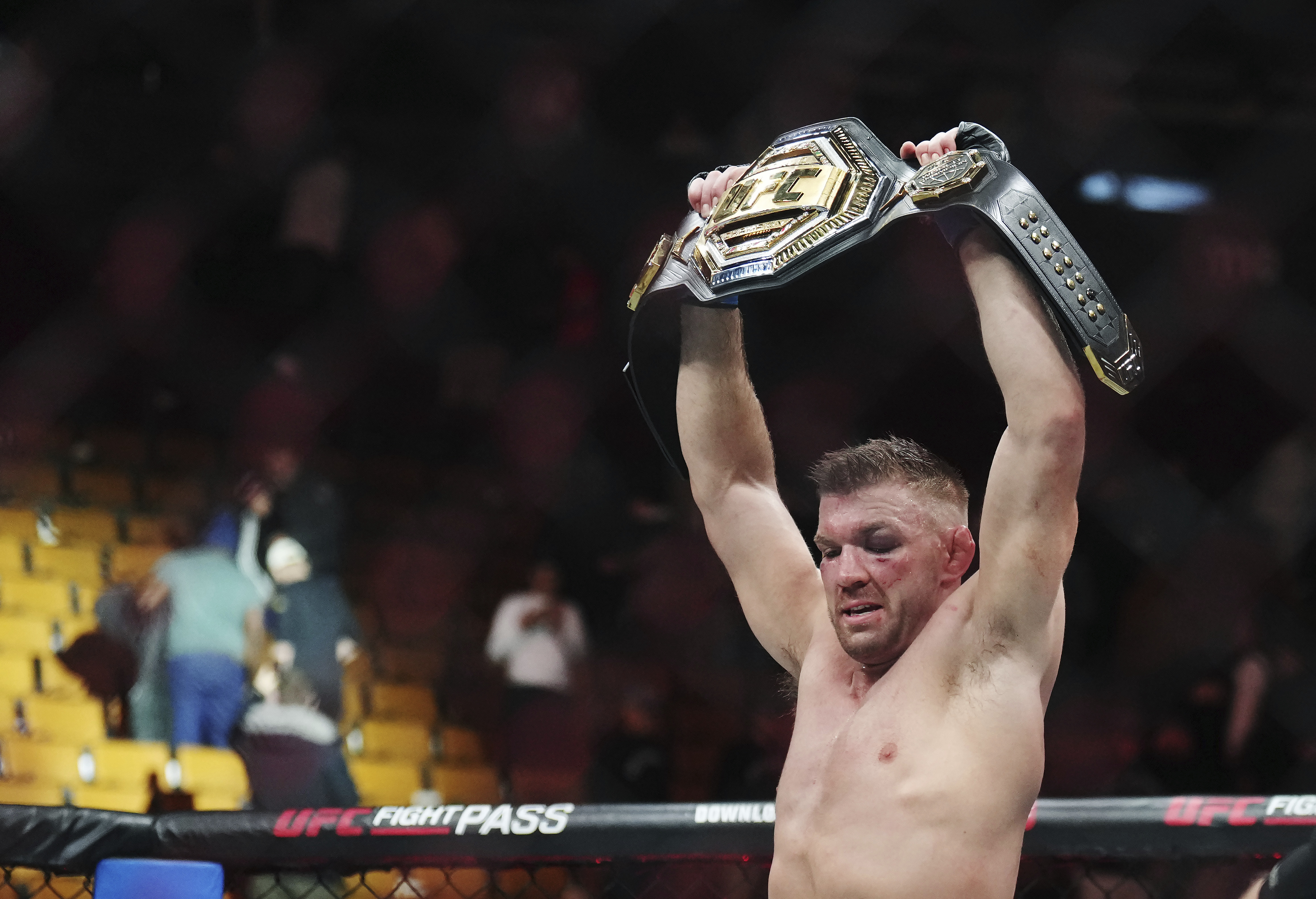 Dricus Du Plessis celebrates after defeating Sean Strickland in a middleweight title bout during the UFC 297 mixed martial arts event in Toronto early Sunday, Jan. 21, 2024.