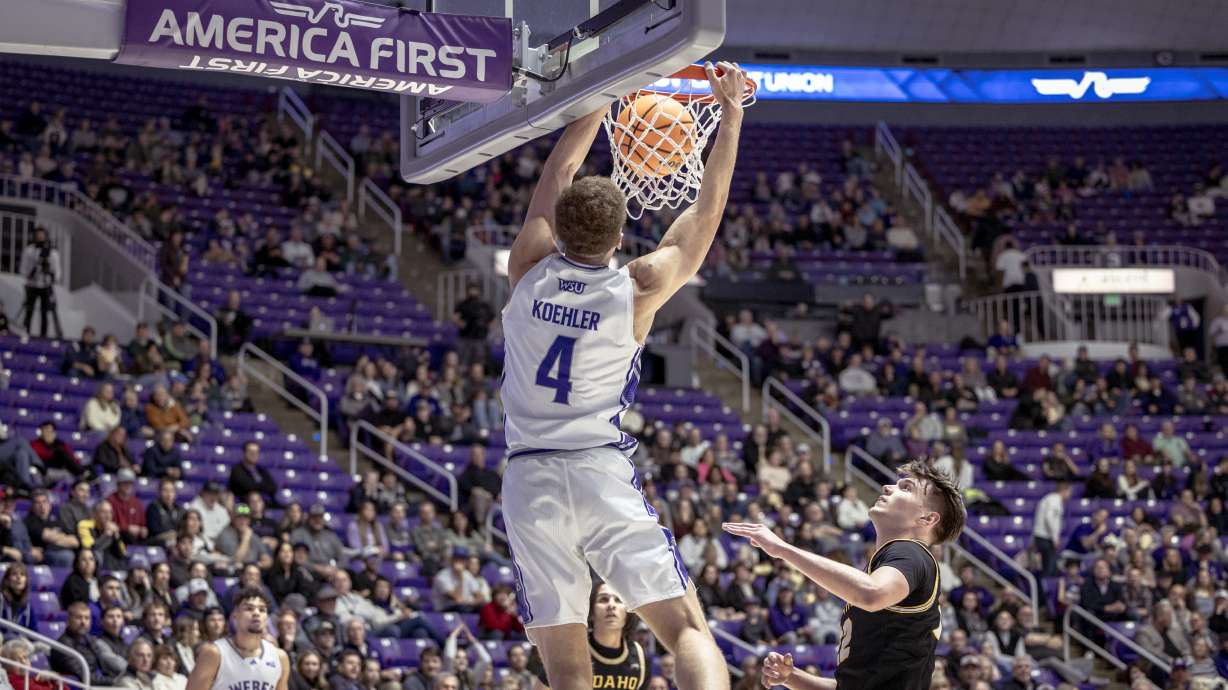 Dyson Koehler dunks during Weber State's Big Sky men's basketball game, Saturday, Jan. 20, 2024, at the Dee Events Center in Ogden.