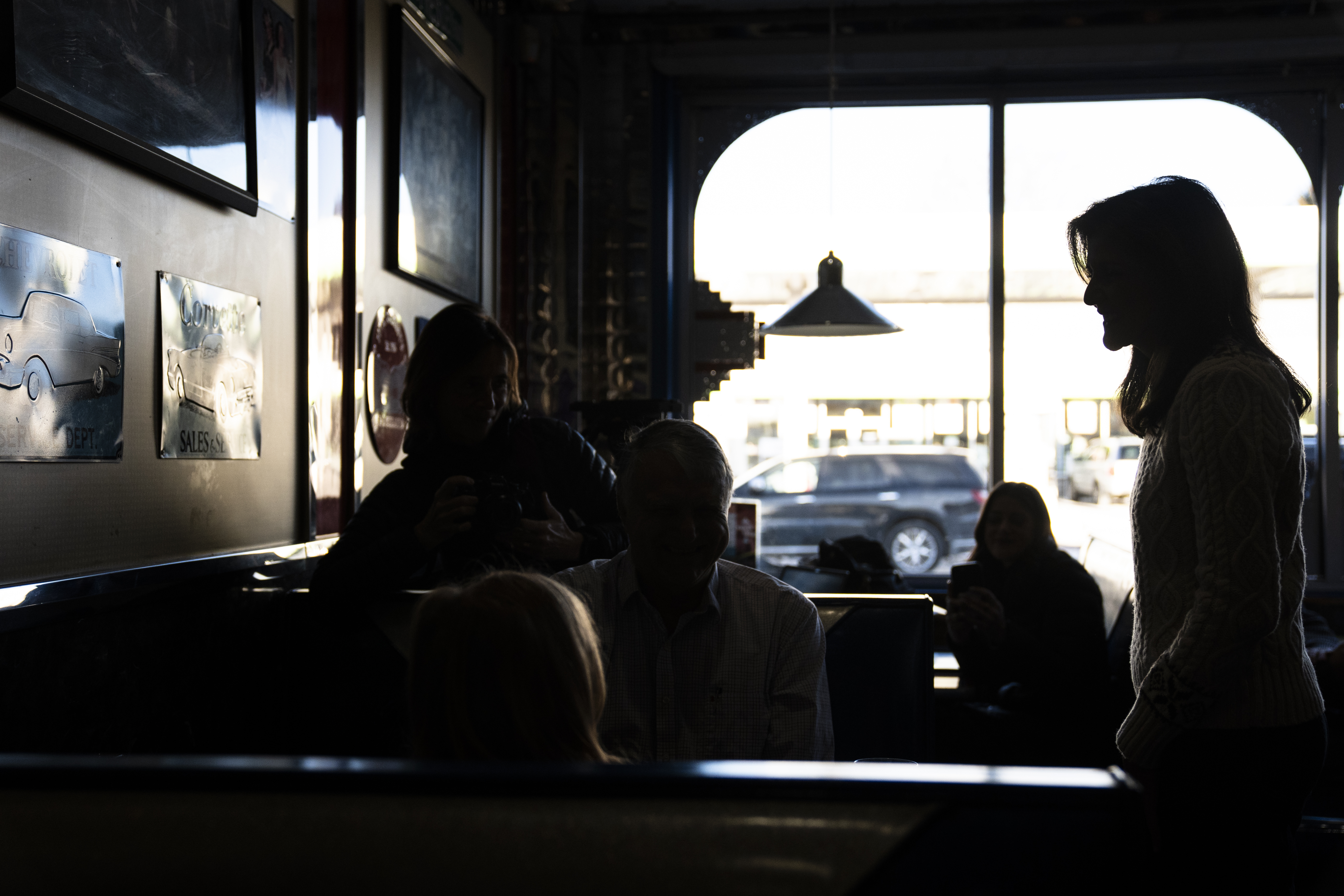 Republican presidential candidate former UN Ambassador Nikki Haley, right, meets with patrons during a campaign stop at Mary Ann's Diner in Derry, N.H., Sunday.