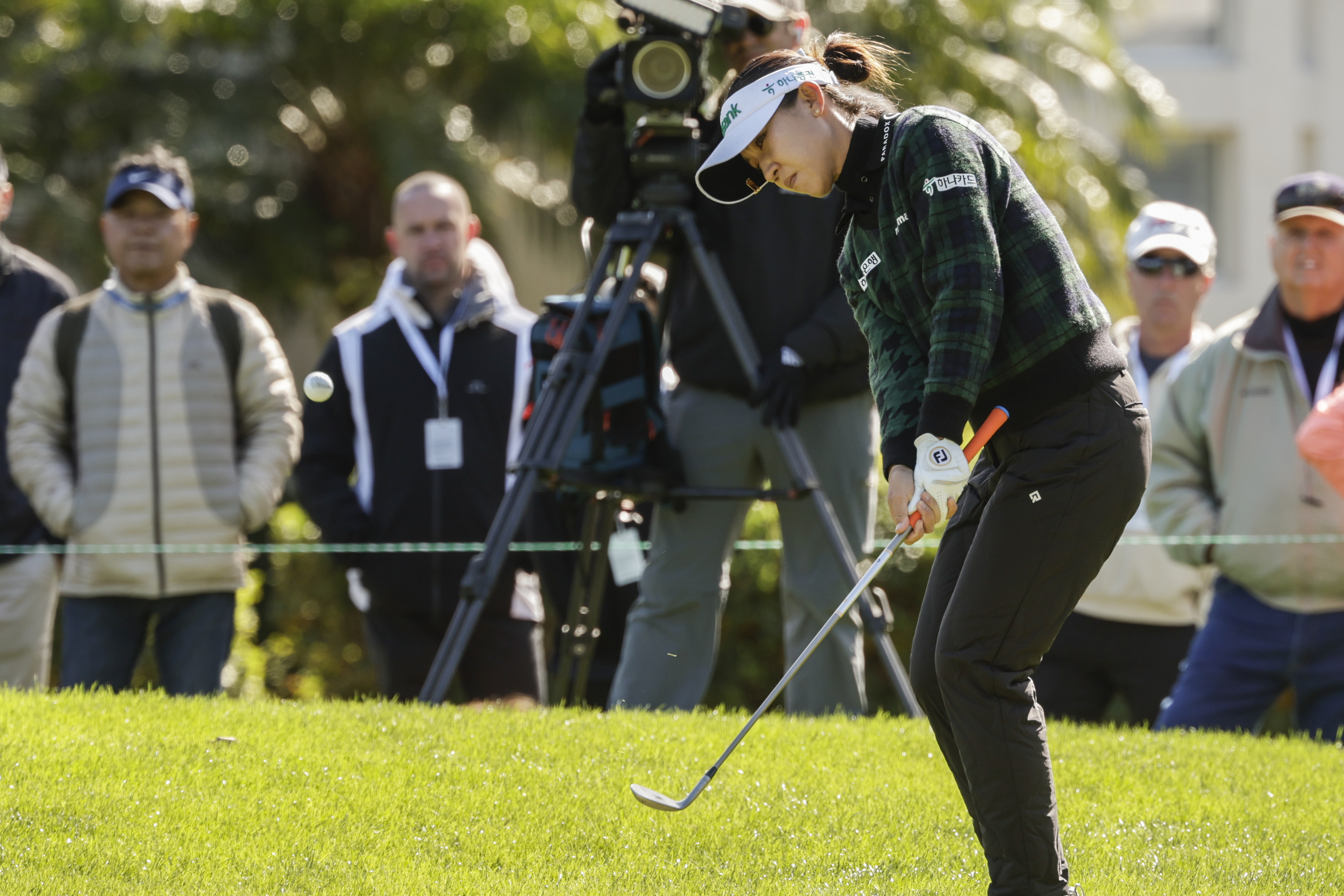 Lydia Ko, chips onto the seventh green during the final round of the Hilton Grand Vacations Tournament of Champions LPGA golf tournament in Orlando, Fla., Sunday, Jan. 21, 2024. 