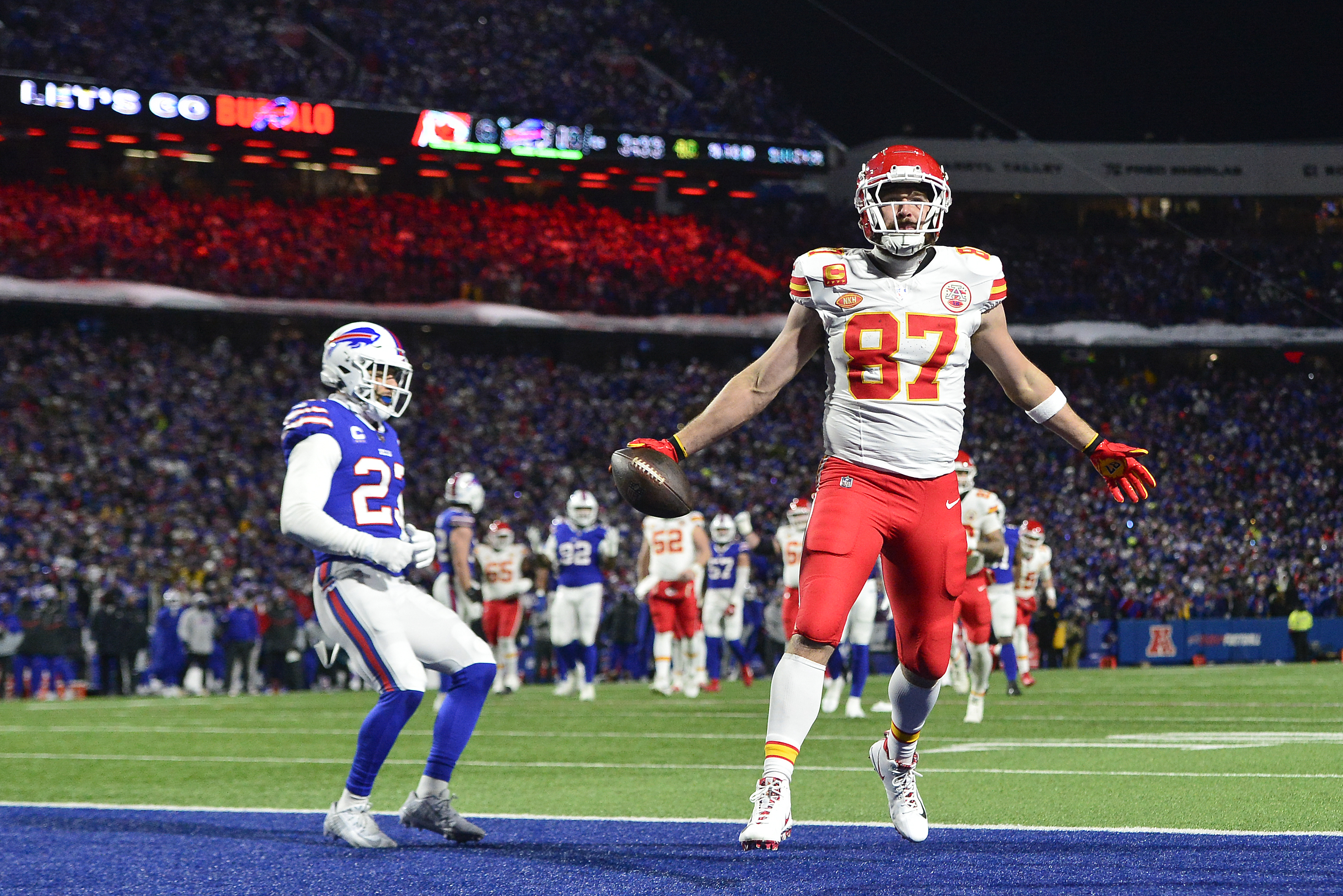 Kansas City Chiefs tight end Travis Kelce (87) scores a touchdown against the Buffalo Bills during the second quarter of an NFL AFC division playoff football game, Sunday, Jan. 21, 2024, in Orchard Park, N.Y. 