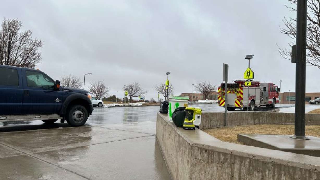 Emergency vehicles in front of Canyon View Middle School, Cedar City, Jan. 21. Students and teachers will move to remote learning for both Monday and Tuesday after people were sickened due to possible exposure to carbon monoxide.
