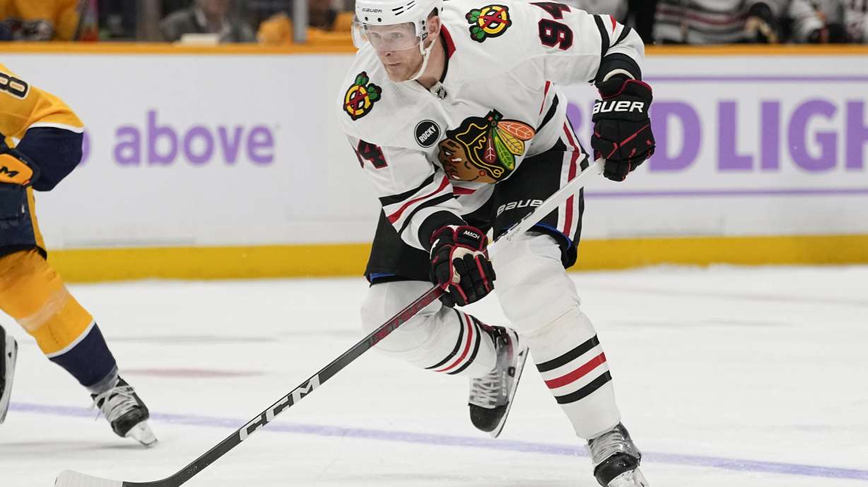 FILE - Chicago Blackhawks right wing Corey Perry (94) plays during the first period of an NHL hockey game against the Nashville Predators, Nov. 18, 2023, in Nashville, Tenn. Perry is eligible to sign an NHL contract with any team in the aftermath of the Blackhawks terminating his deal for this season, citing inappropriate conduct.