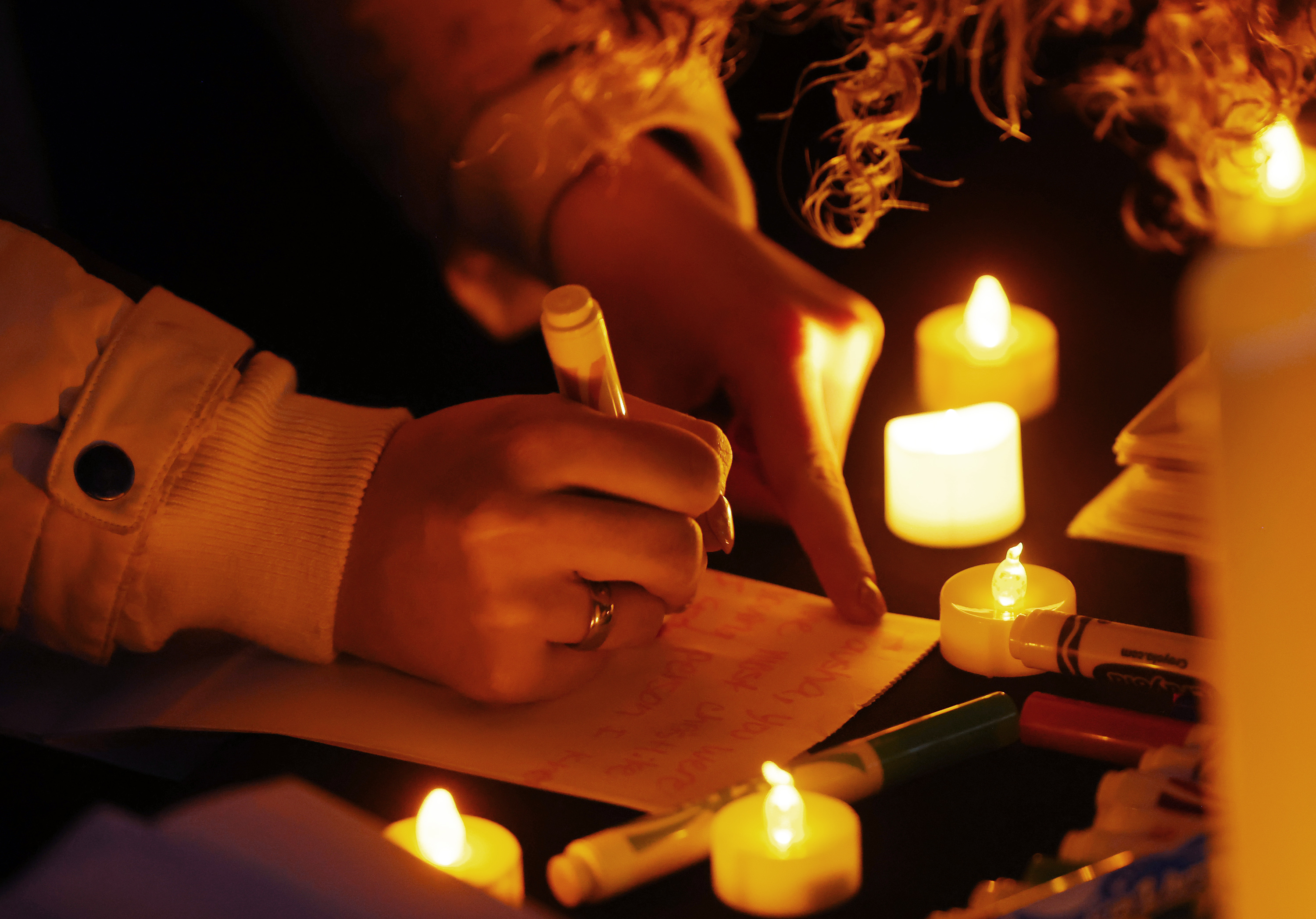 A vigil is held in honor of Gail Earl and the Haight Family Jan. 13, 2023 in Enoch. They were among 94 homicide victims in Utah last year, an increase over 2022.
