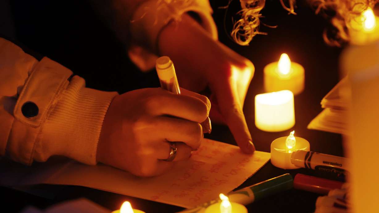 A vigil is held in honor of Gail Earl and the Haight Family Jan. 13, 2023 in Enoch. They were among 94 homicide victims in Utah last year, an increase over 2022.