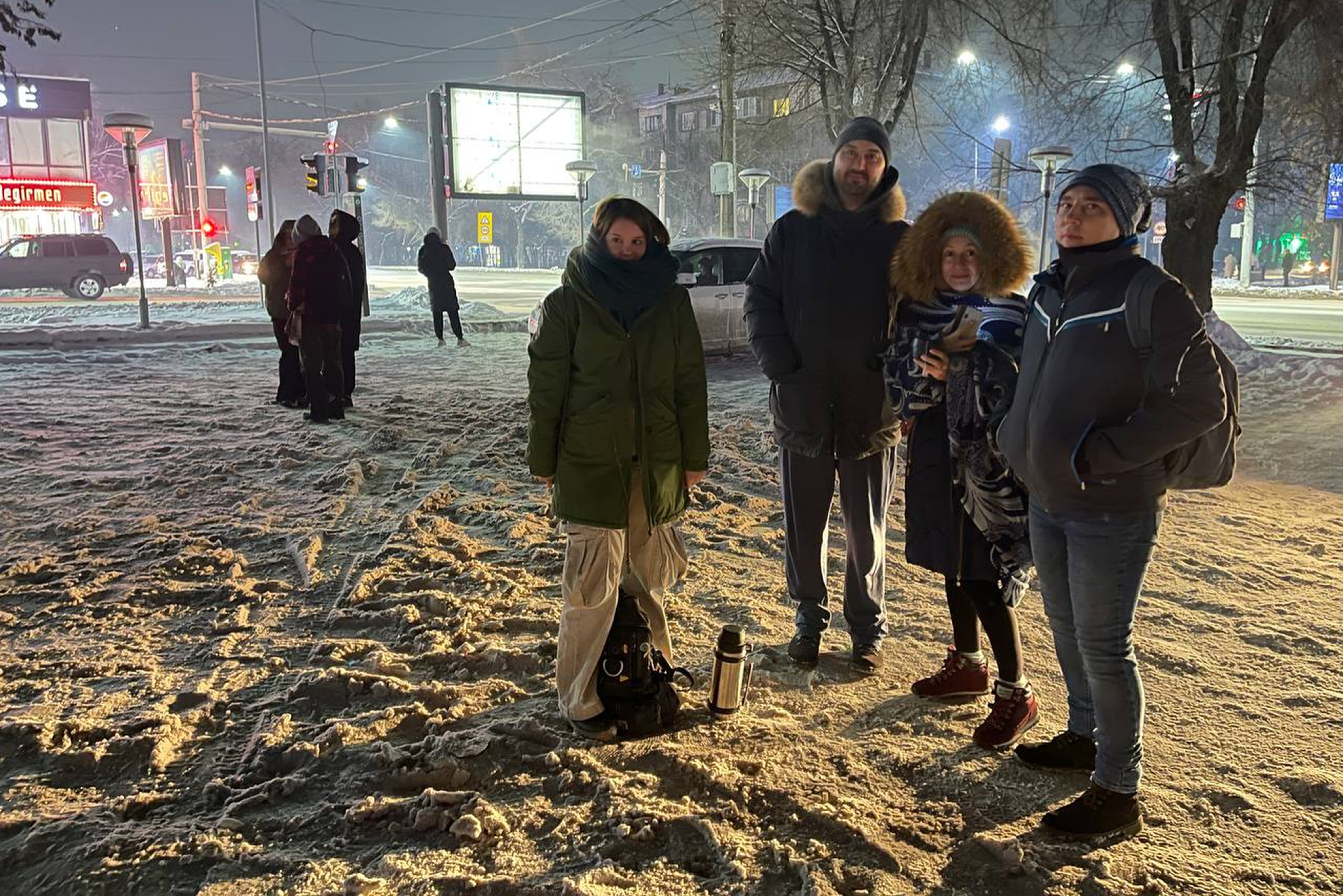 People gather in Almaty, Kazakhstan, Monday after a magnitude 7.1 earthquake struck a remote part of China’s western Xinjiang region early Tuesday. Tremors were felt as far away as the neighboring countries Kyrgyzstan and Kazakhstan. In the Kazakh capital of Almaty, people left their homes, the Russian news agency Tass reported.