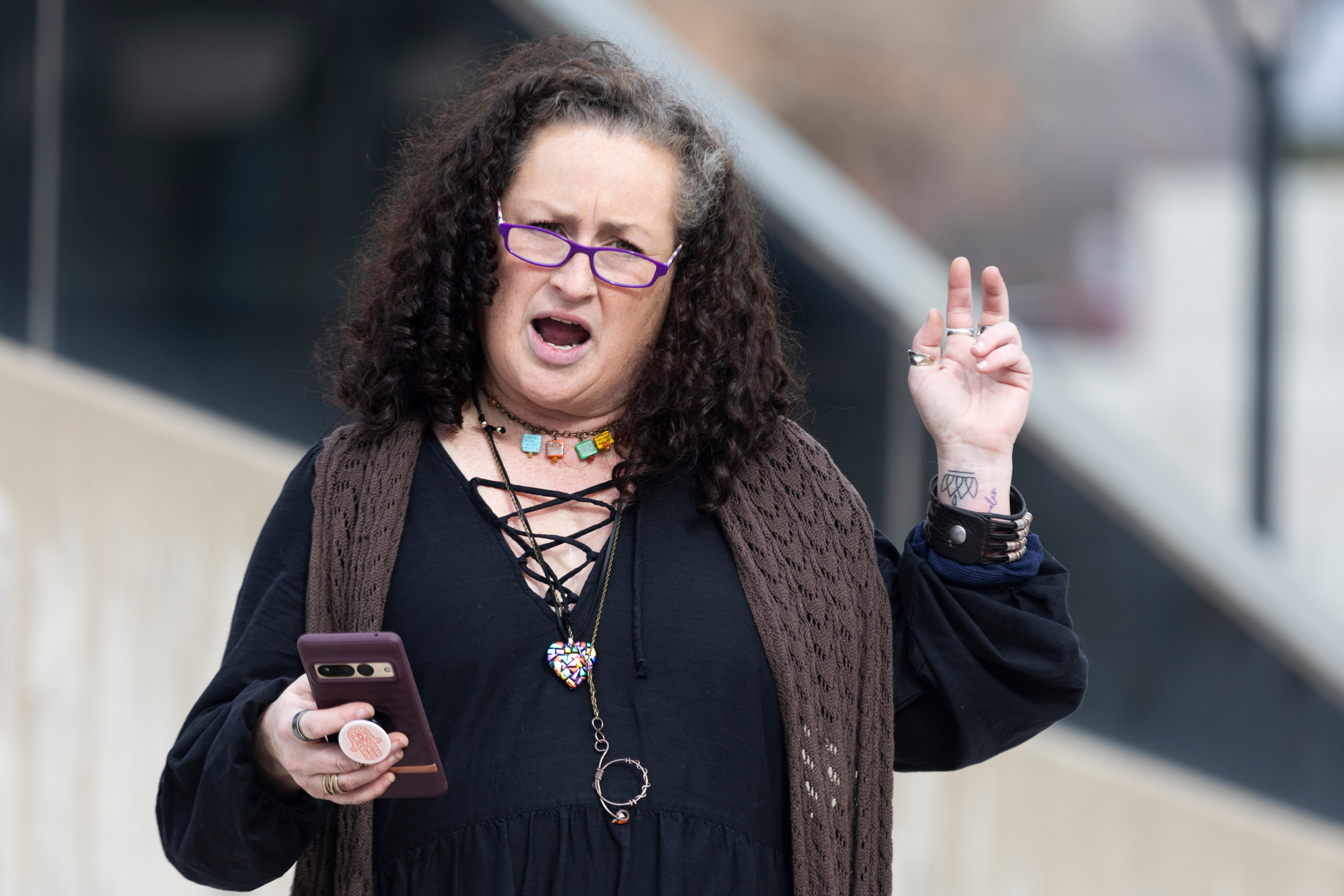 Juliet Reynolds speaks to University of Utah students gathered at the Marriott Library to protest against a diversity, equity and inclusion bill introduced in the Utah Legislature in Salt Lake City on Monday.