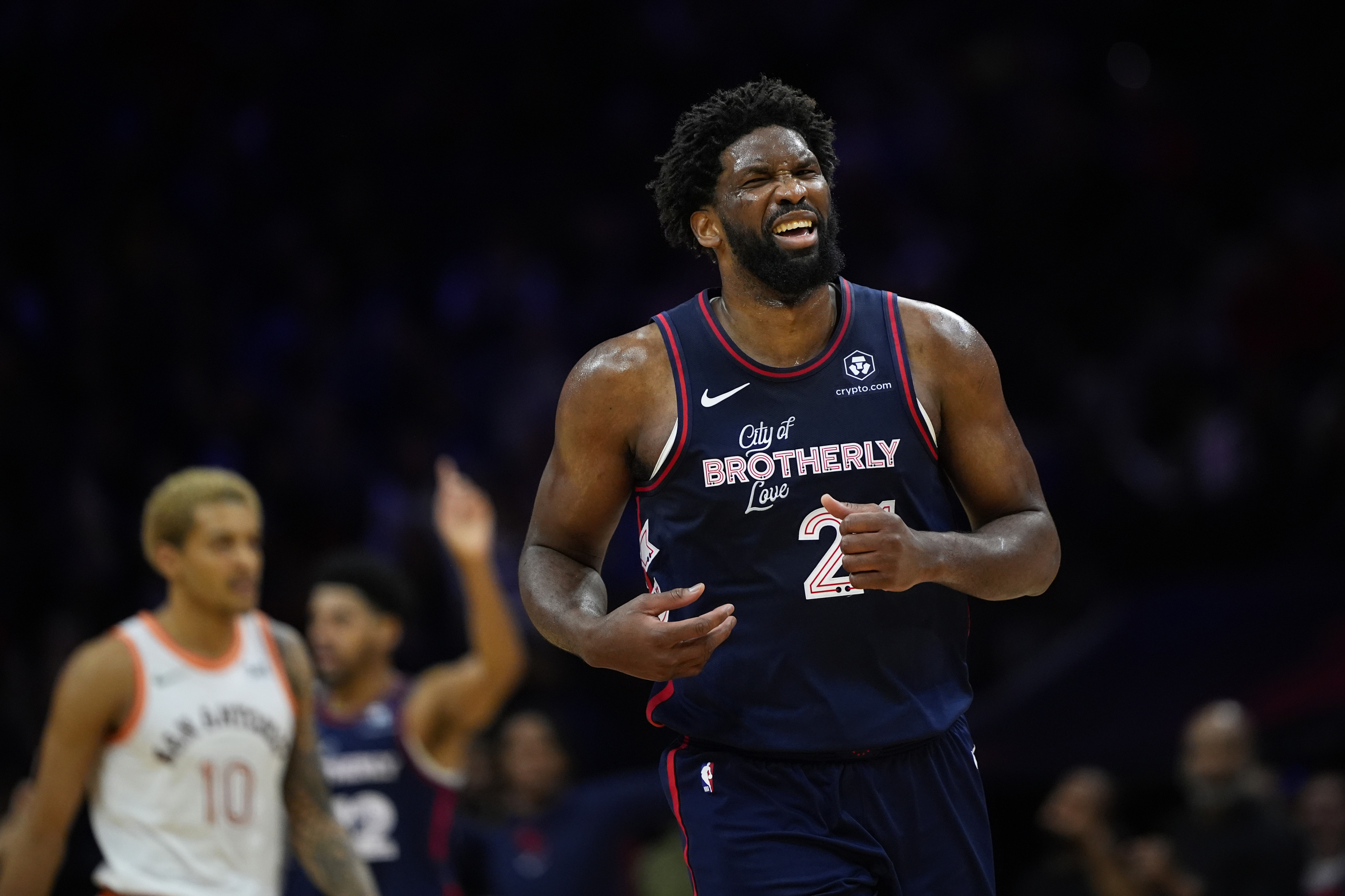 Philadelphia 76ers' Joel Embiid, right, reacts during the second half of an NBA basketball game against the San Antonio Spurs, Monday, Jan. 22, 2024, in Philadelphia. 
