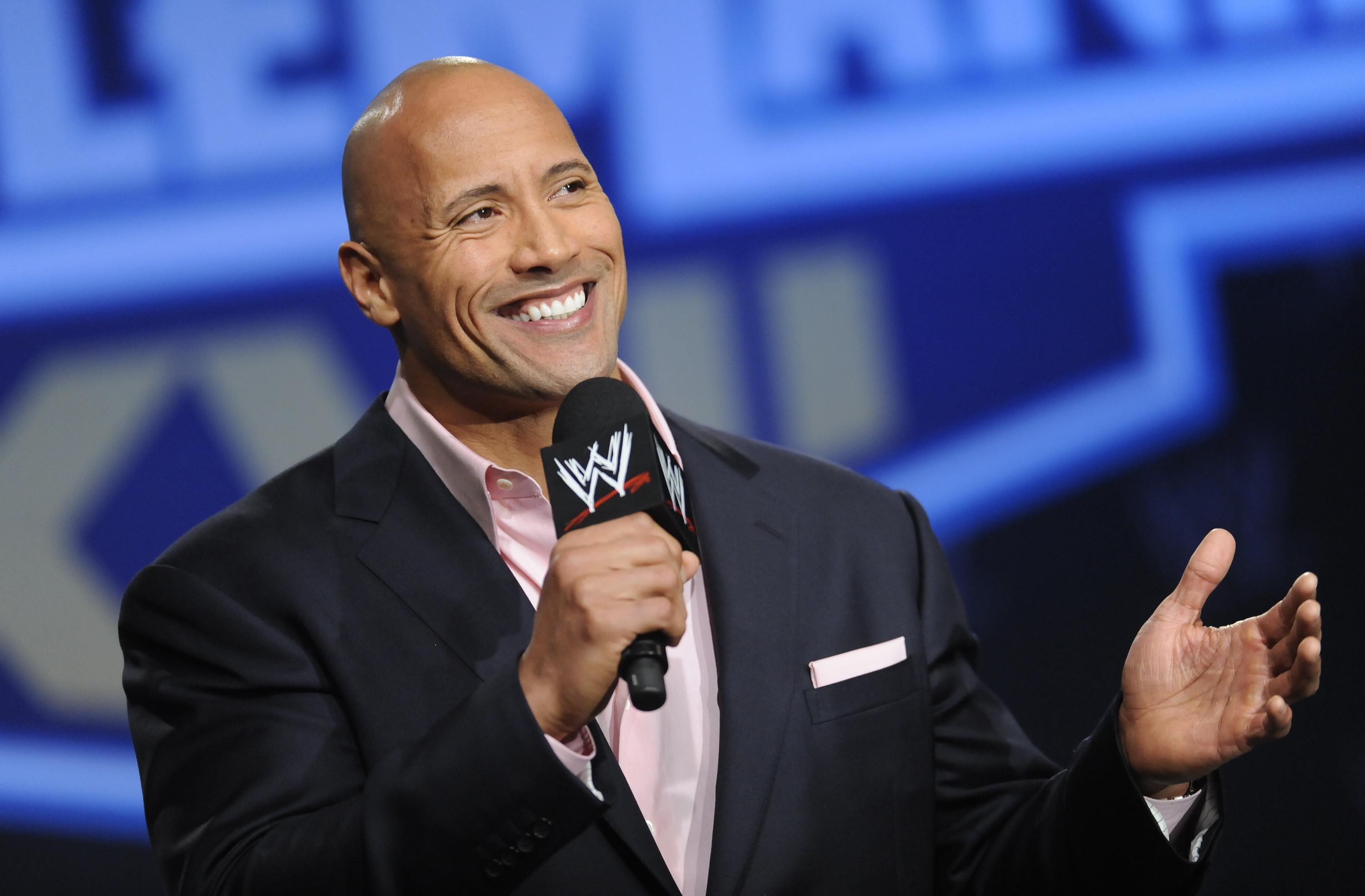 Actor and former WWE Superstar Dwayne "The Rock" Johnson is seen at the Hard Rock Cafe in Times Square on Mar. 30, 2011, in New York. Johnson will have rights to his nickname under a new agreement.