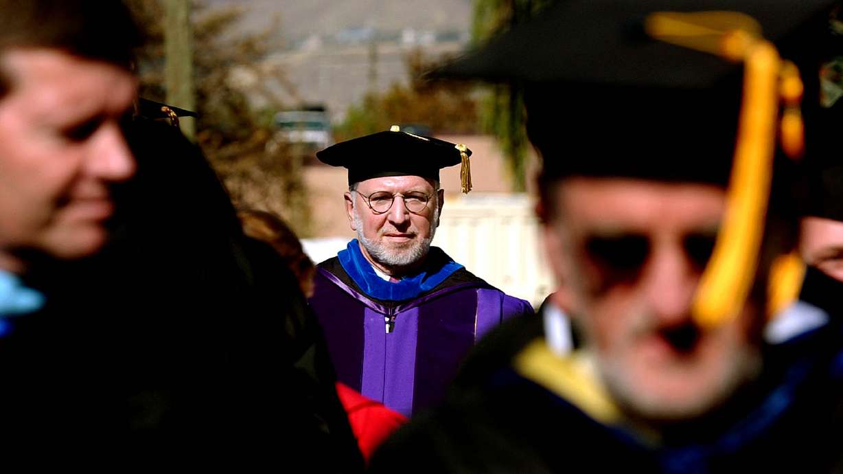 Michael S. Bassis proceeds into his inauguration as the 16th president of Westminster College on Oct. 19, 2002. Bassis died Tuesday, surrounded by his daughters in Springfield, Virginia.