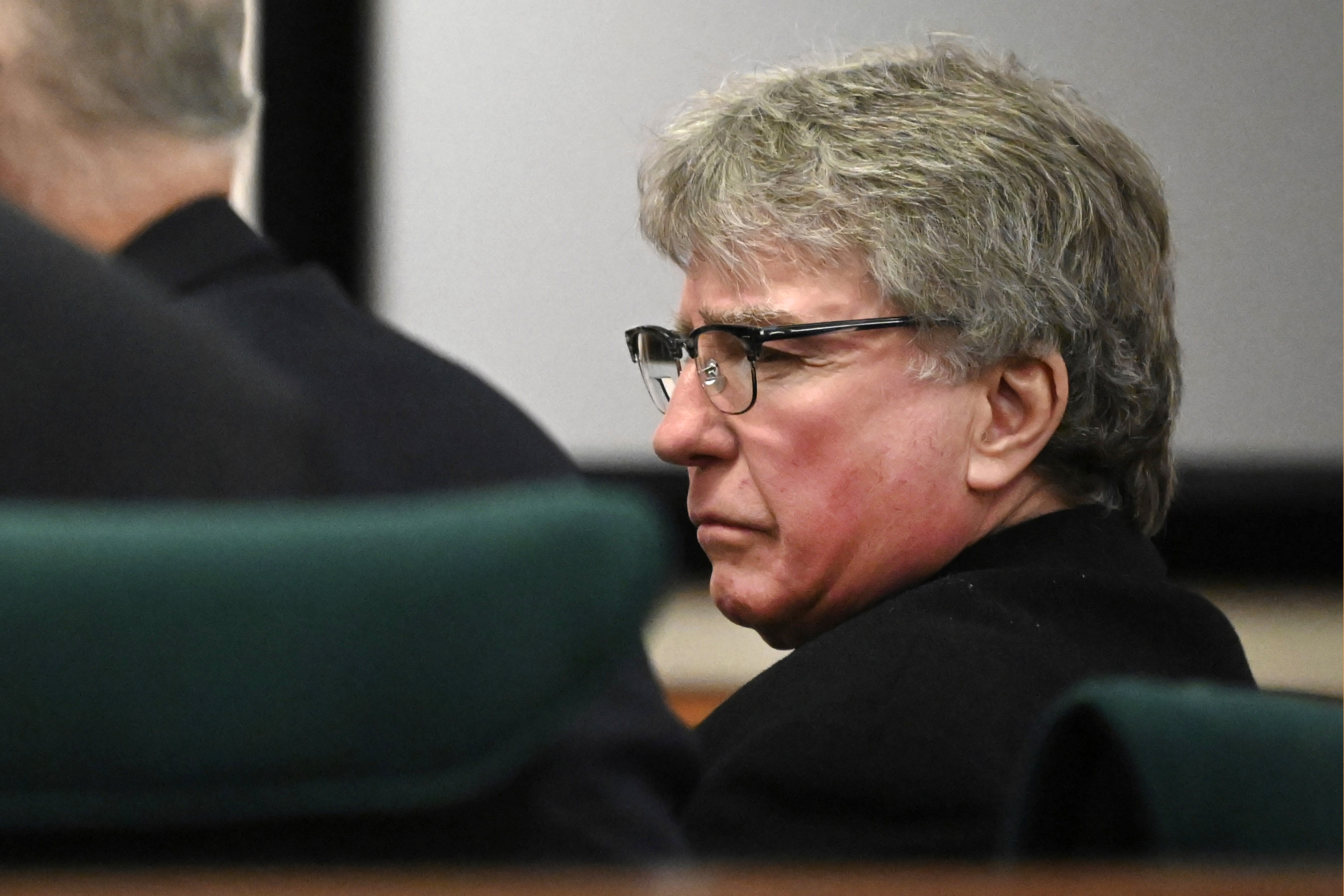 Defendant Kevin Monahan listens to summations in his murder trial before County Judge Adam Michelini, Tuesday at the Washington County Courthouse in Fort Edward, N.Y. Monahan, 66, was convicted Tuesday of second-degree murder for fatally shooting a young woman after the SUV she was riding in mistakenly drove into his rural driveway in upstate New York.