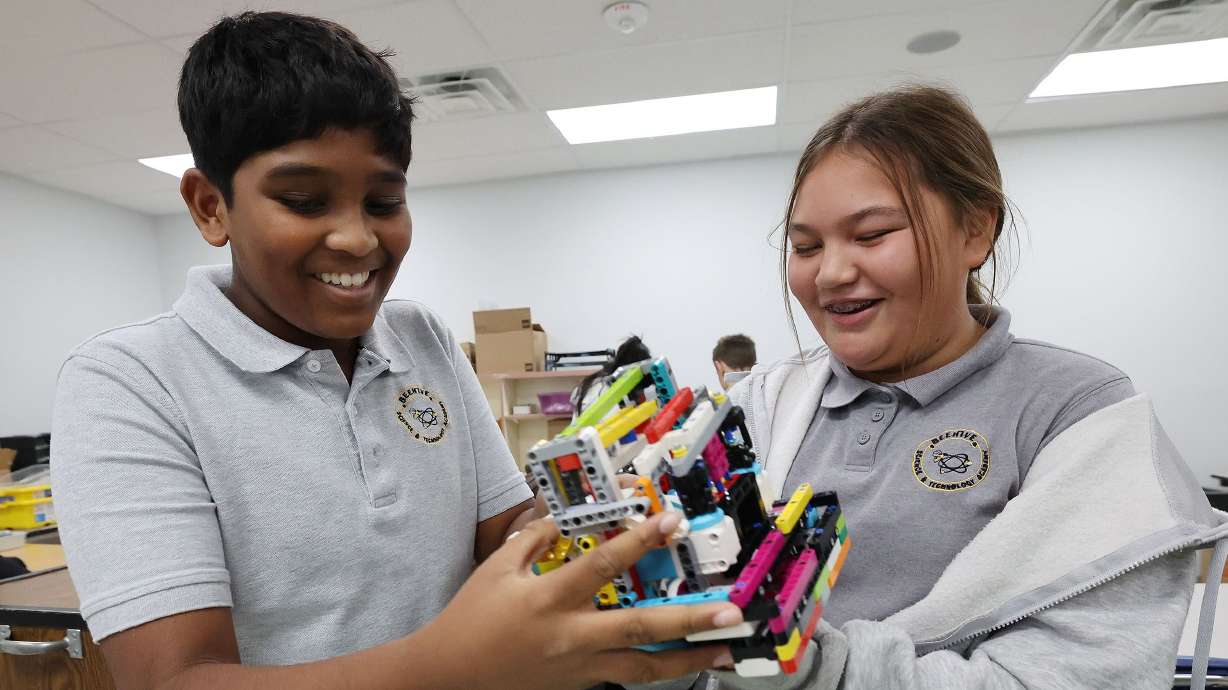 Divan Narsipuram and Lilly Ostler work with an autonomous robot at the Beehive Science and Technology Academy in Sandy on Nov. 3, 2022. This week is National School Choice Week.