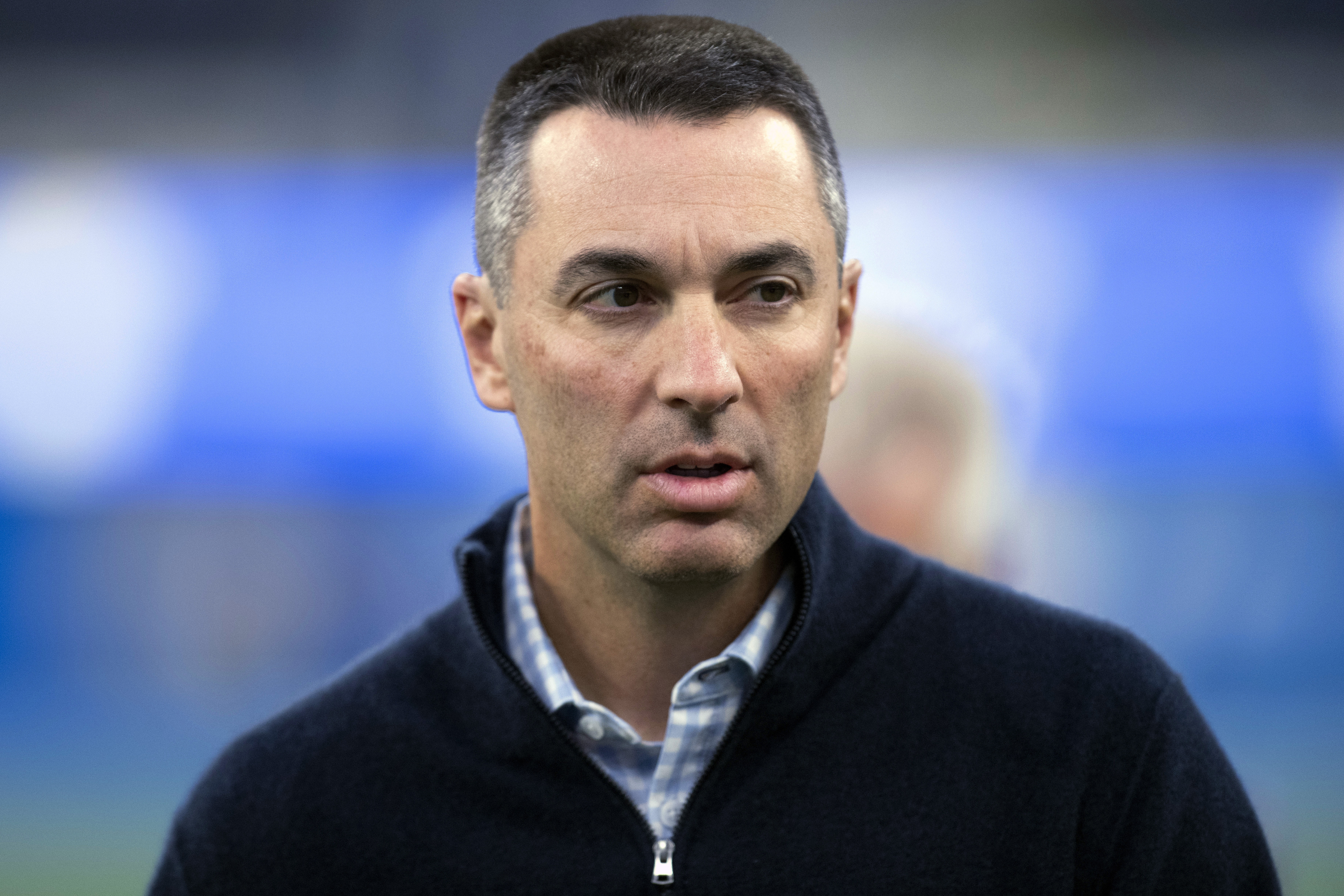 FILE - Los Angeles Chargers general manager Tom Telesco walks on the field before the team's NFL football game against the Kansas City Chiefs on Dec. 16, 2021, in Inglewood, Calif. The Las Vegas Raiders hired Telesco on Tuesday, Jan. 23, as their next general manager, passing over interim Champ Kelly for the position. 