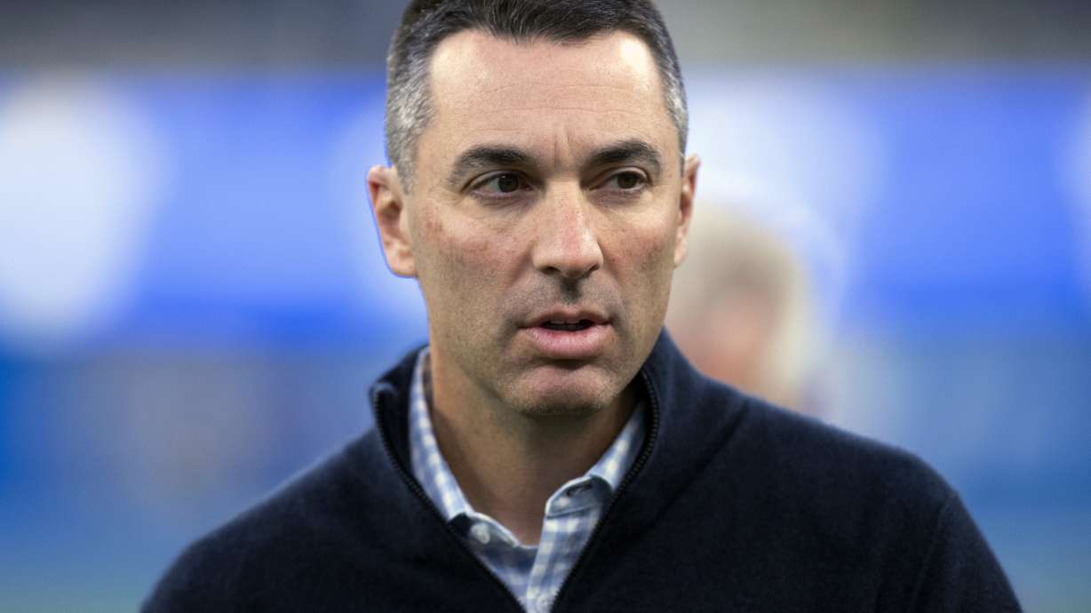 FILE - Los Angeles Chargers general manager Tom Telesco walks on the field before the team's NFL football game against the Kansas City Chiefs on Dec. 16, 2021, in Inglewood, Calif. The Las Vegas Raiders hired Telesco on Tuesday, Jan. 23, as their next general manager, passing over interim Champ Kelly for the position.