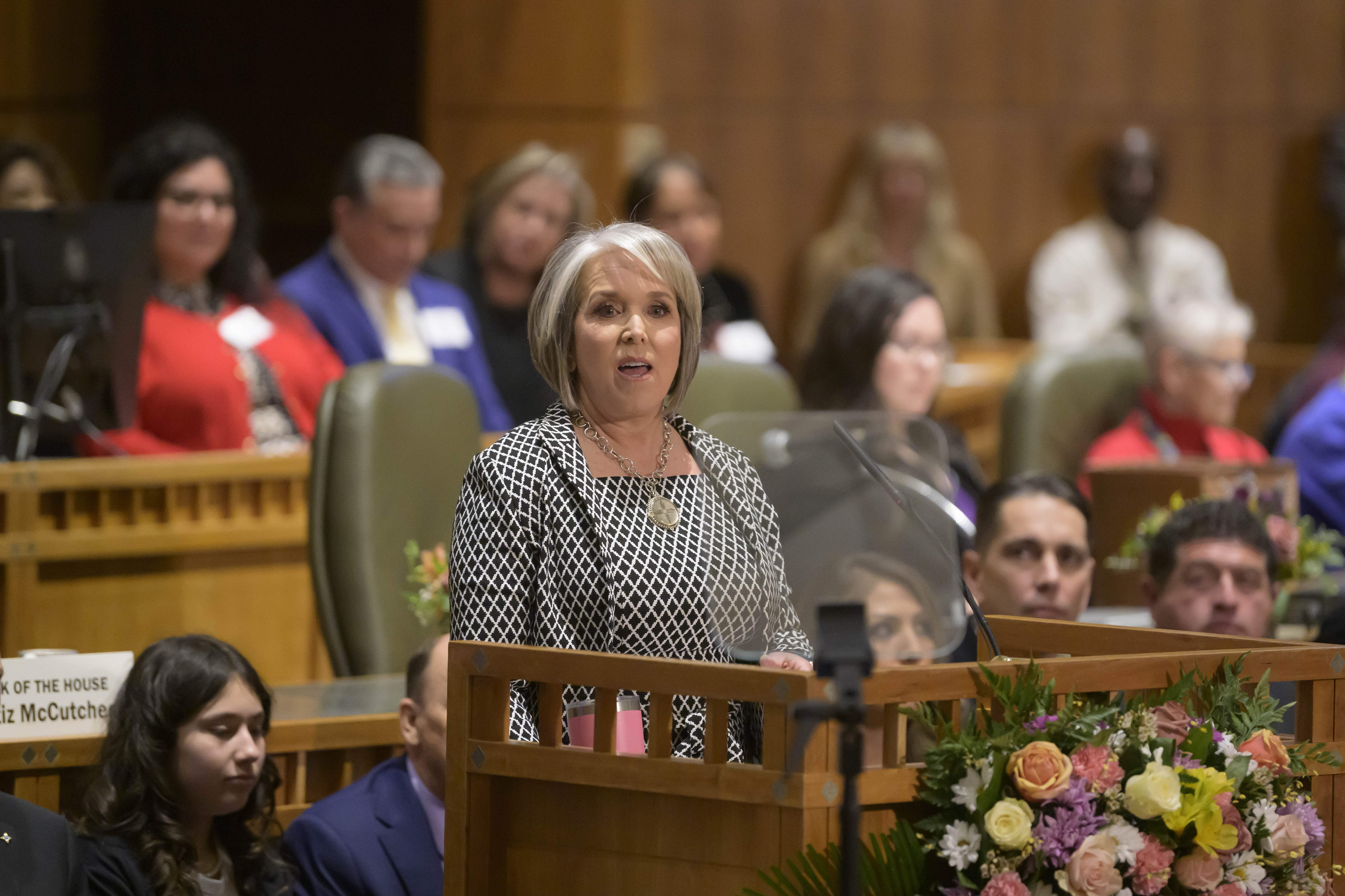 New Mexico Gov. Michelle Lujan Grisham delivers her State of the State speech for the start of the 56th Legislature at the Capitol, Tuesday in Santa Fe, N.M. A U.S. District Court judge order favors rights to carry guns in some public parks in New Mexico.