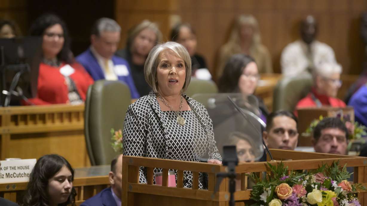New Mexico Gov. Michelle Lujan Grisham delivers her State of the State speech for the start of the 56th Legislature at the Capitol, Tuesday in Santa Fe, N.M. A U.S. District Court judge order favors rights to carry guns in some public parks in New Mexico.