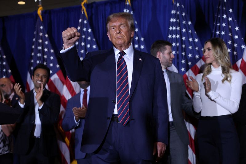Republican presidential candidate and former President Donald Trump gestures during his New Hampshire presidential primary election night watch party, in Nashua, New Hampshire, Tuesday.