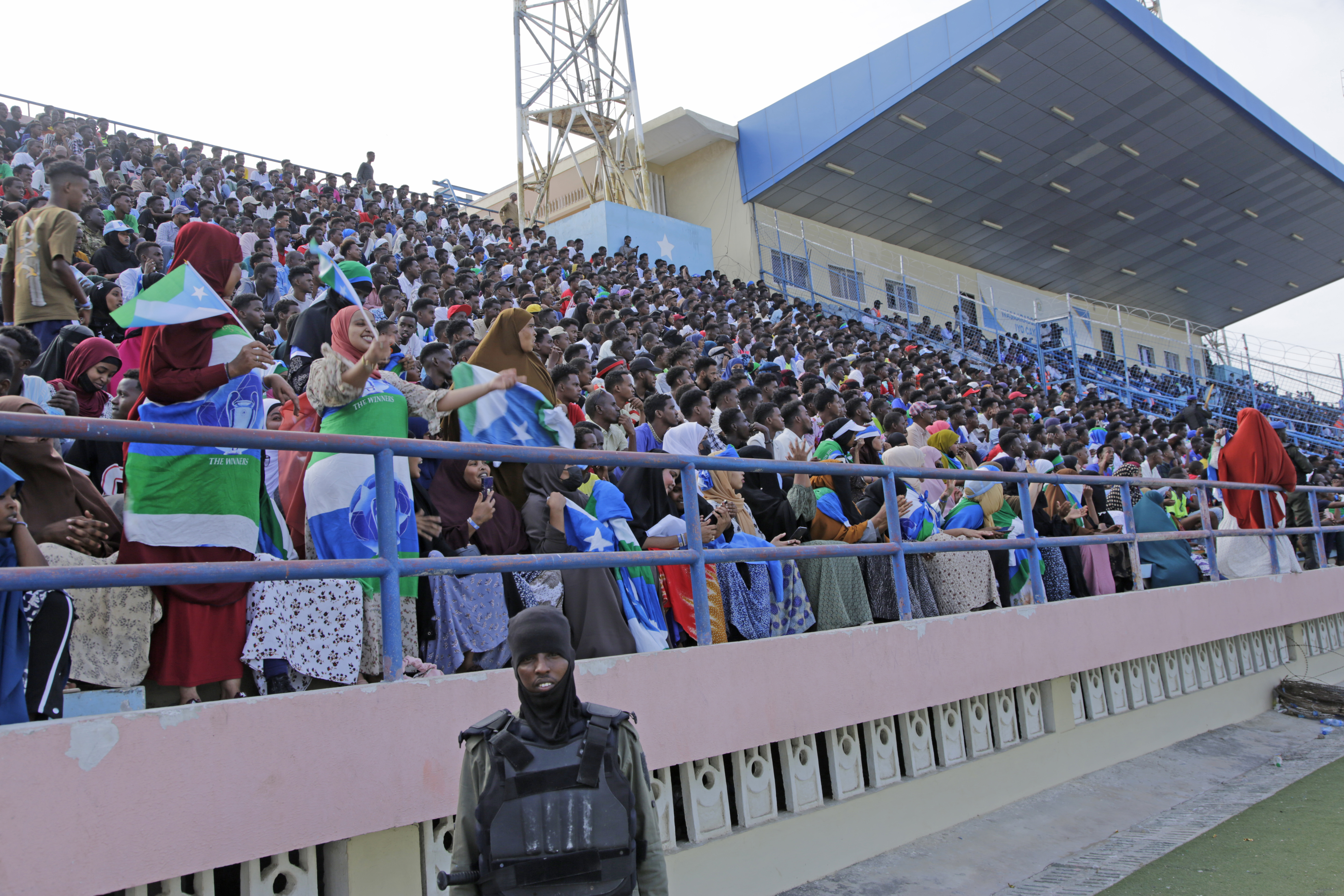 Fans watch the soccer league match between Hirshabele and Jubaland at a stadium in Mogadishu, Somalia, Tuesday, Jan 23, 2024. Somali authorities have in recent years been working to restore the national stadium in Mogadishu. A stadium in the violence-prone Somali capital is hosting its first soccer tournament in three decades, drawing thousands of people to a sports facility that had fallen into disuse and later became a military base amid civil war. 