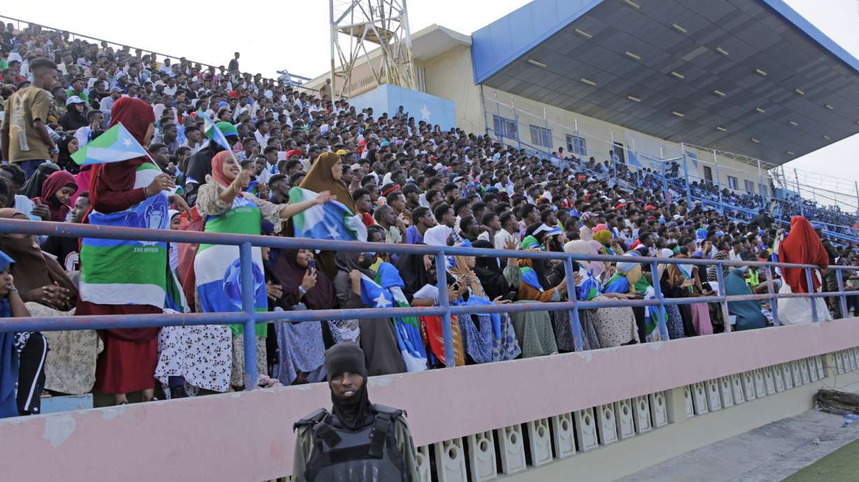 Fans watch the soccer league match between Hirshabele and Jubaland at a stadium in Mogadishu, Somalia, Tuesday, Jan 23, 2024. Somali authorities have in recent years been working to restore the national stadium in Mogadishu. A stadium in the violence-prone Somali capital is hosting its first soccer tournament in three decades, drawing thousands of people to a sports facility that had fallen into disuse and later became a military base amid civil war.