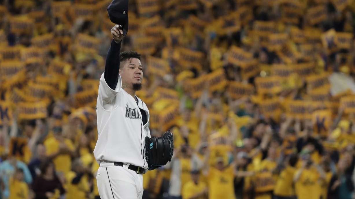 FILE - With the "King's Court" cheering section behind him, Seattle Mariners starting pitcher Félix Hernández tips his cap as he takes the mound for the team's baseball game against the Oakland Athletics, Sept. 26, 2019, in Seattle. Ichiro Suzuki headlines the group of players who are eligible for Hall of Fame voting a year from now. That ballot is also expected to include Cy Young Award winners CC Sabathia and Hernández — and the final chance for reliever Billy Wagner, who fell five votes short this time.