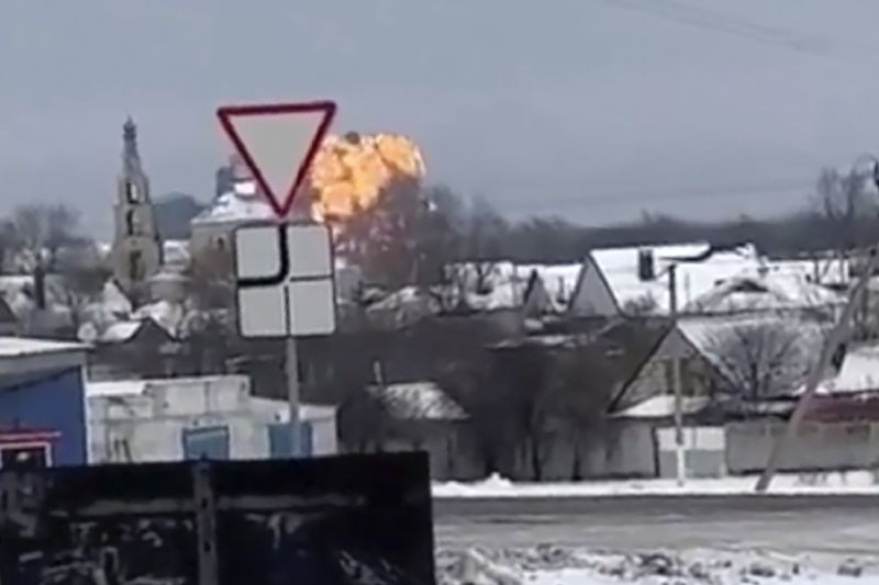 Video shows flames rising from the scene of a warplane crashed at a residential area near Yablonovo, Belgorod region, Wednesday. Russia says a military transport plane that was carrying 65 Ukrainian prisoners of war has crashed in a Russian region near Ukraine.