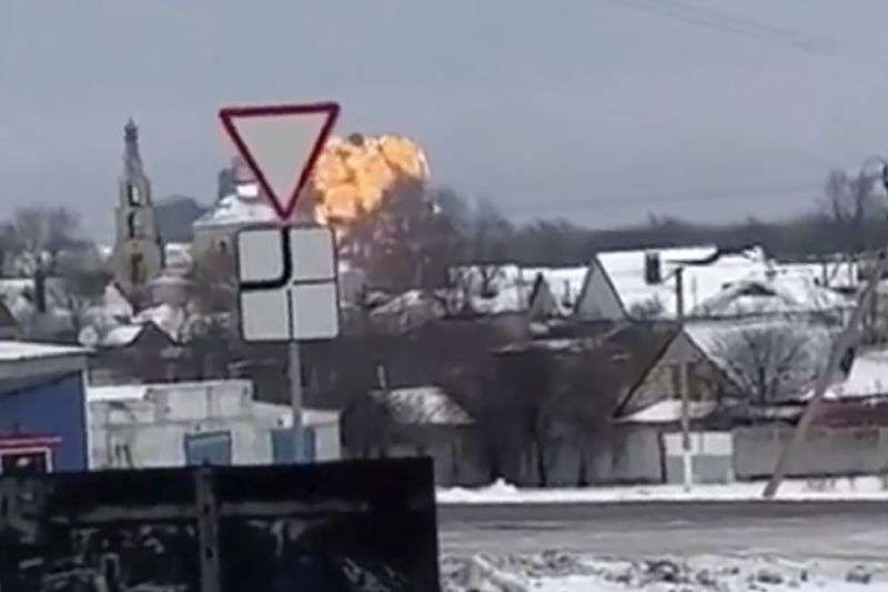 Video shows flames rising from the scene of a warplane crashed at a residential area near Yablonovo, Belgorod region, Wednesday. Russia says a military transport plane that was carrying 65 Ukrainian prisoners of war has crashed in a Russian region near Ukraine.