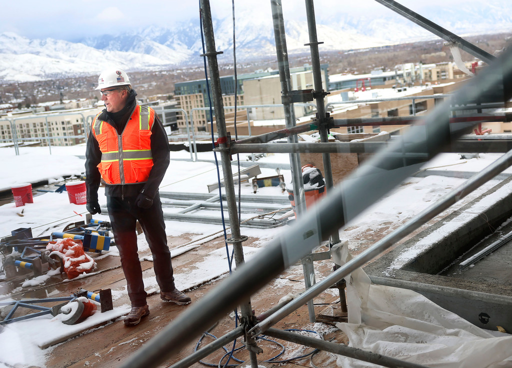 Dave Layton, president & CEO of Layton Construction, surveys the construction of The Worthington in Salt Lake City on Jan. 11.